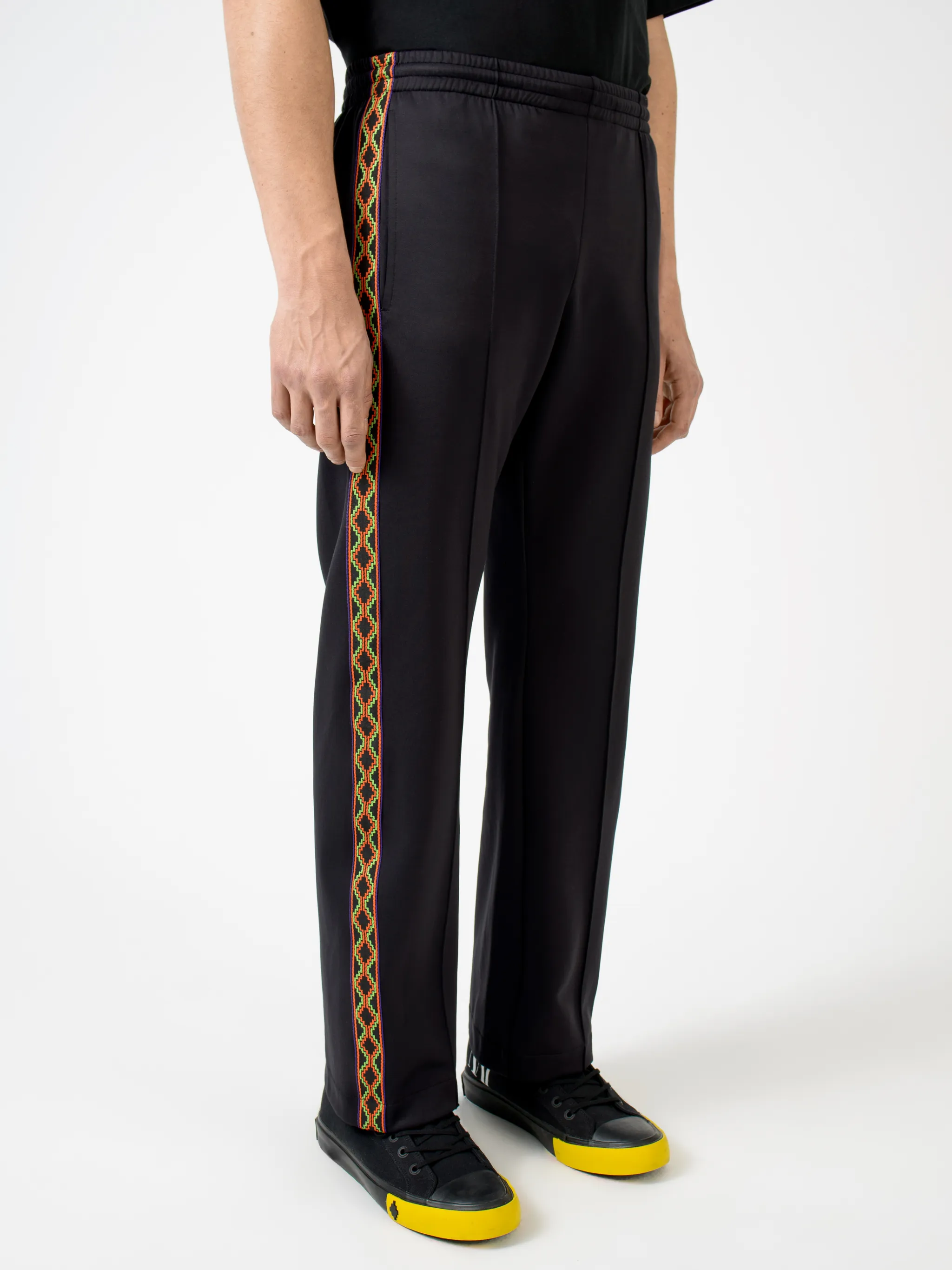 Black/orange/beige cotton-blend Folk tape panel track pants from Marcelo Burlon County of Milan featuring logo-tape detailing, elasticated waistband, two side patch pockets, rear patch pocket, embroidered logo to the rear and straight leg.