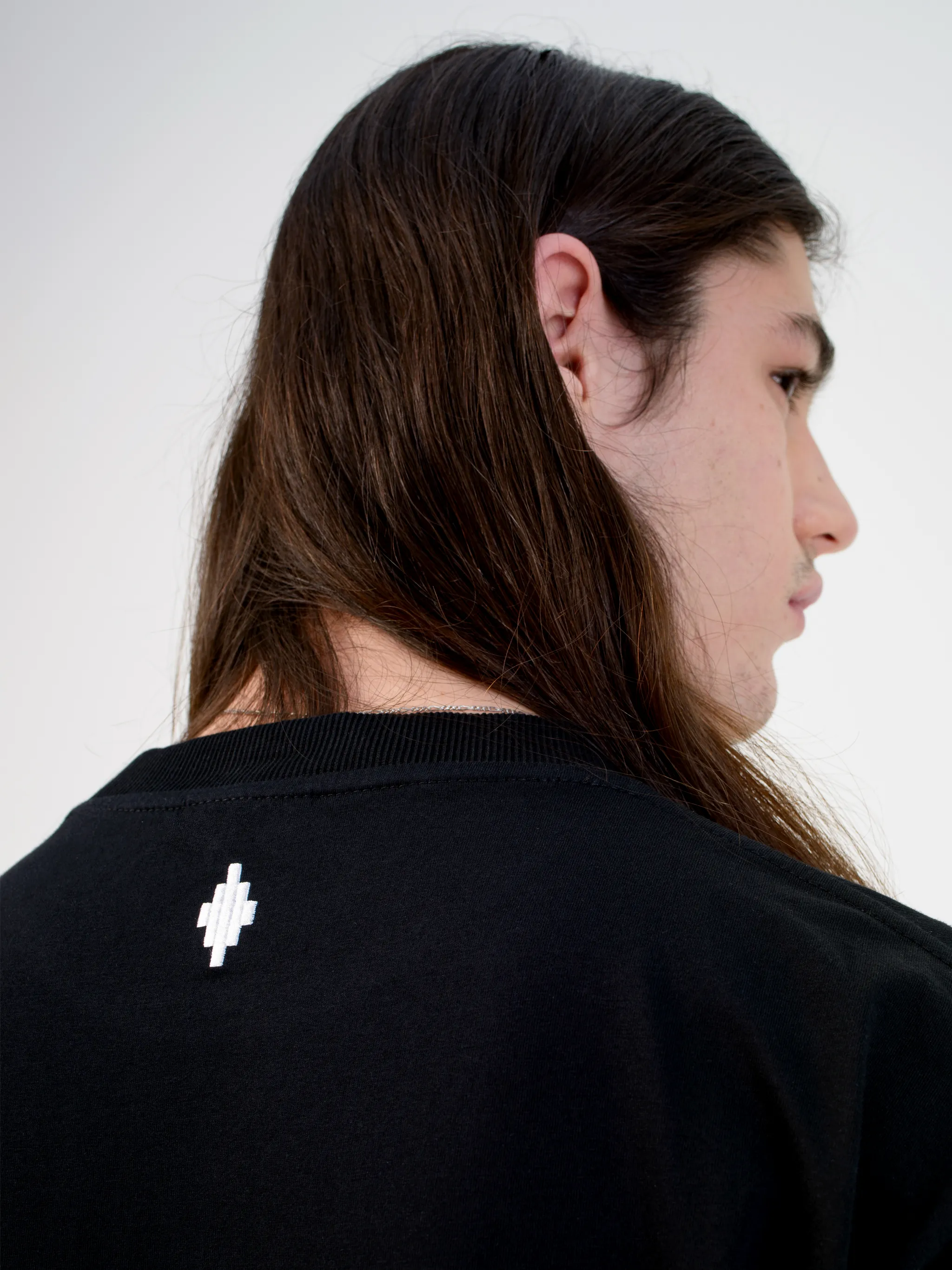 Black/multicolour graphic print cotton T-shirt from Marcelo Burlon County of Milan featuring graphic print, round neck, short sleeves and straight hem.
