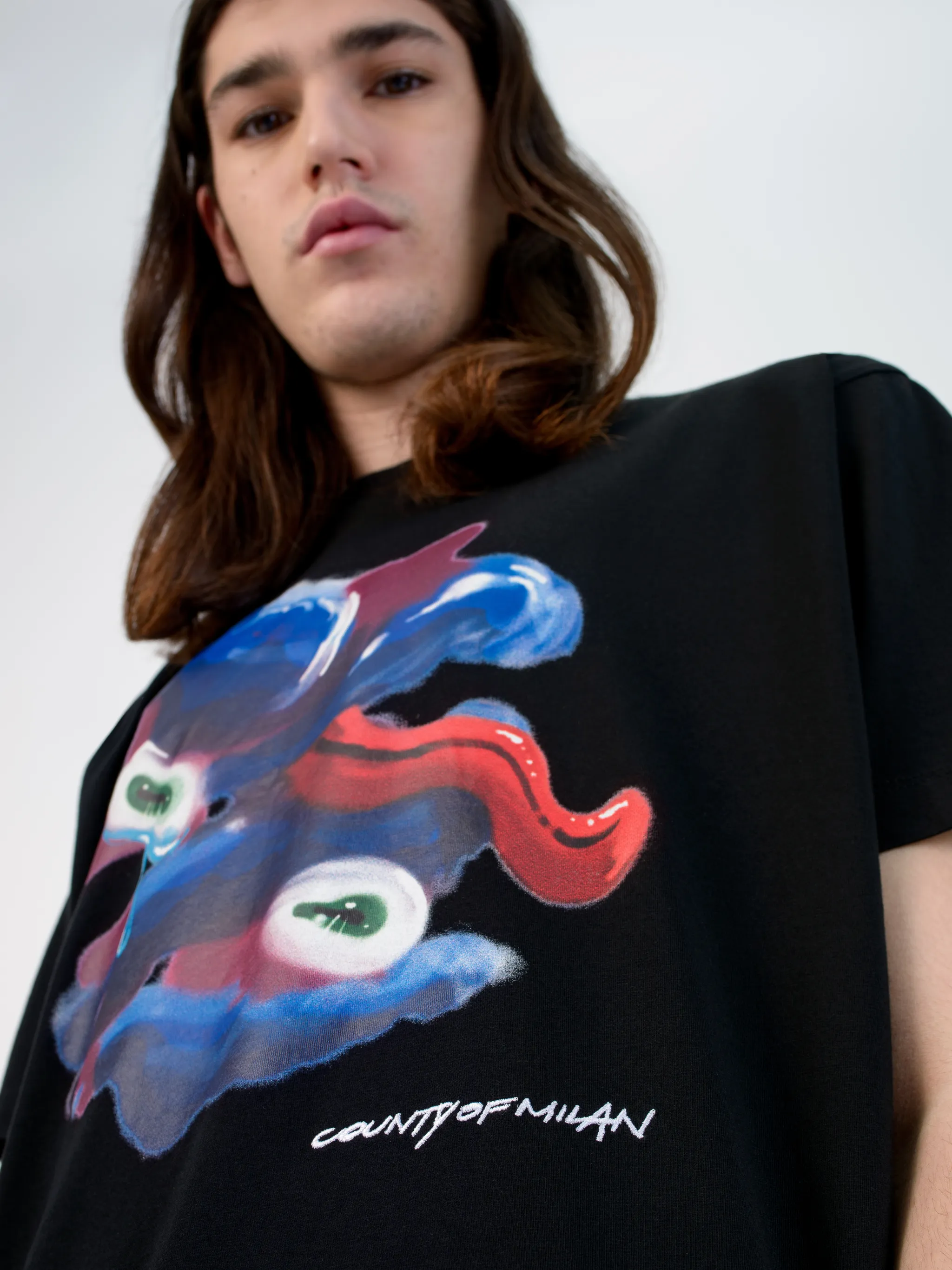 Black/multicolour graphic print cotton T-shirt from Marcelo Burlon County of Milan featuring graphic print, round neck, short sleeves and straight hem.