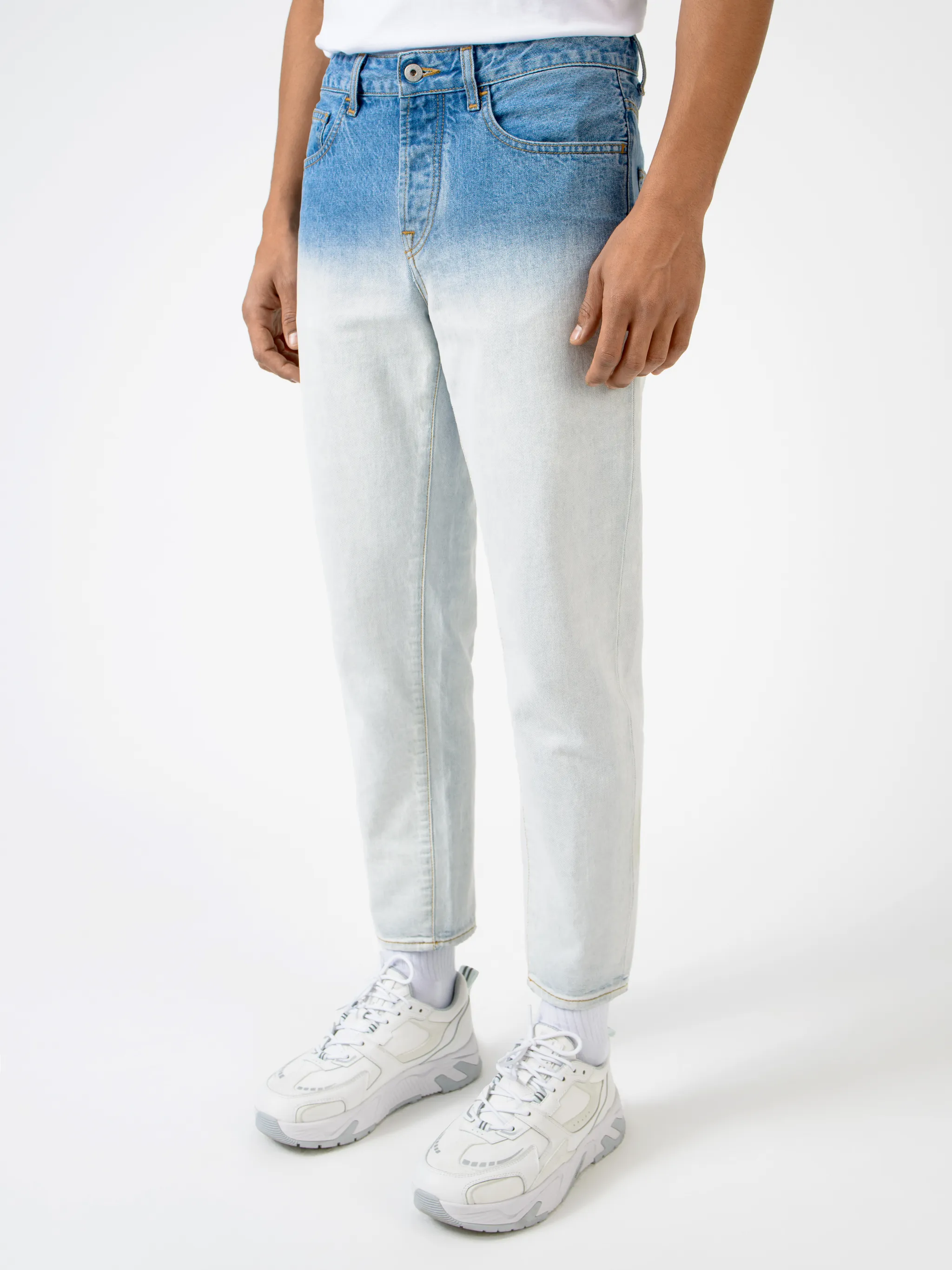Blue cotton-blend gradient-effect straight-leg jeans from Marcelo Burlon County of Milan featuring gradient effect, logo patch to the rear, belt loops, mid-rise, front button and zip fastening, straight leg and classic five pockets.