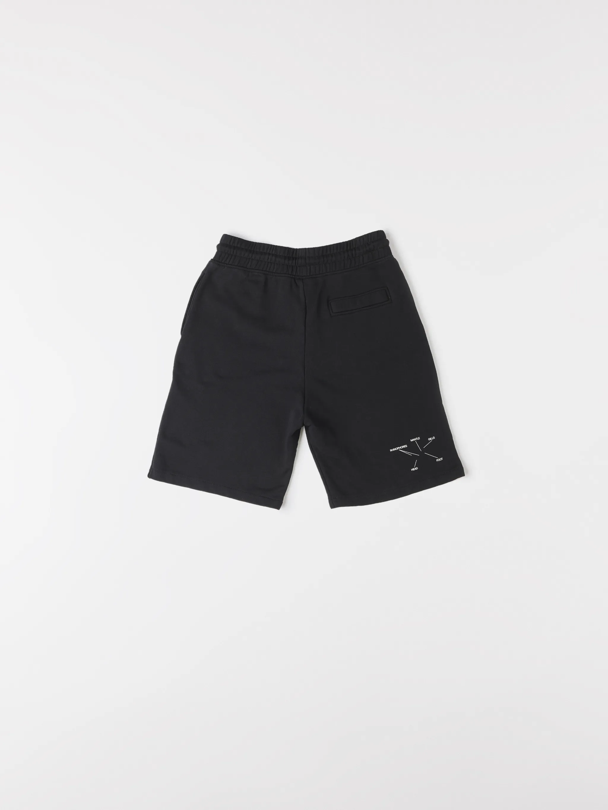 Black cotton printed Illustrated track shorts from Marcelo Burlon County of Milan featuring logo print to the rear, elasticated waistband, drawstring fastening, two side patch pockets, embroidered logo, rear pouch pocket and tonal stitching.