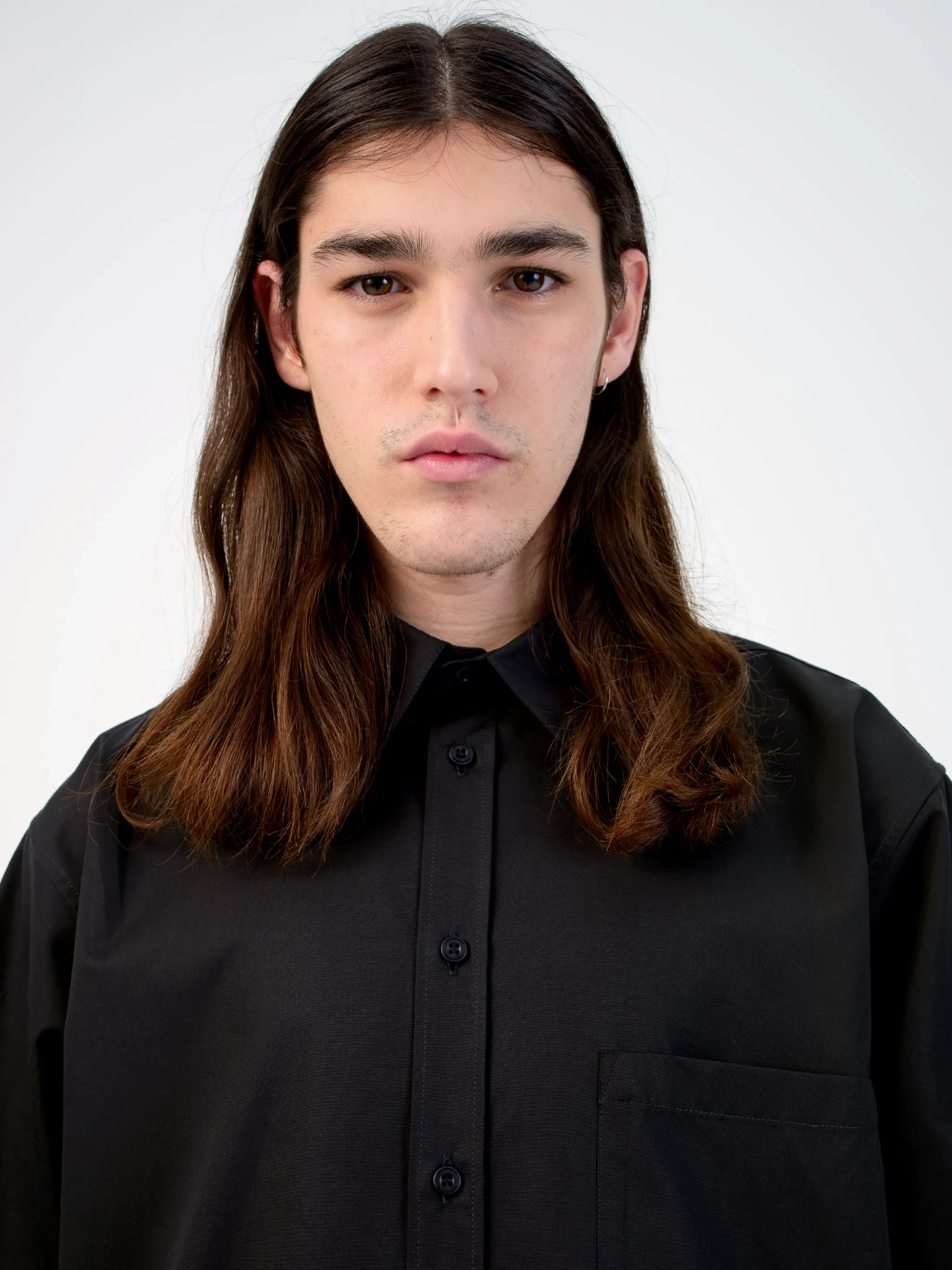 Black cotton logo-print short-sleeve shirt from Marcelo Burlon County of Milan featuring logo print to the rear, logo patches to the front, classic collar, front button fastening, short sleeves, chest patch pocket and curved hem.