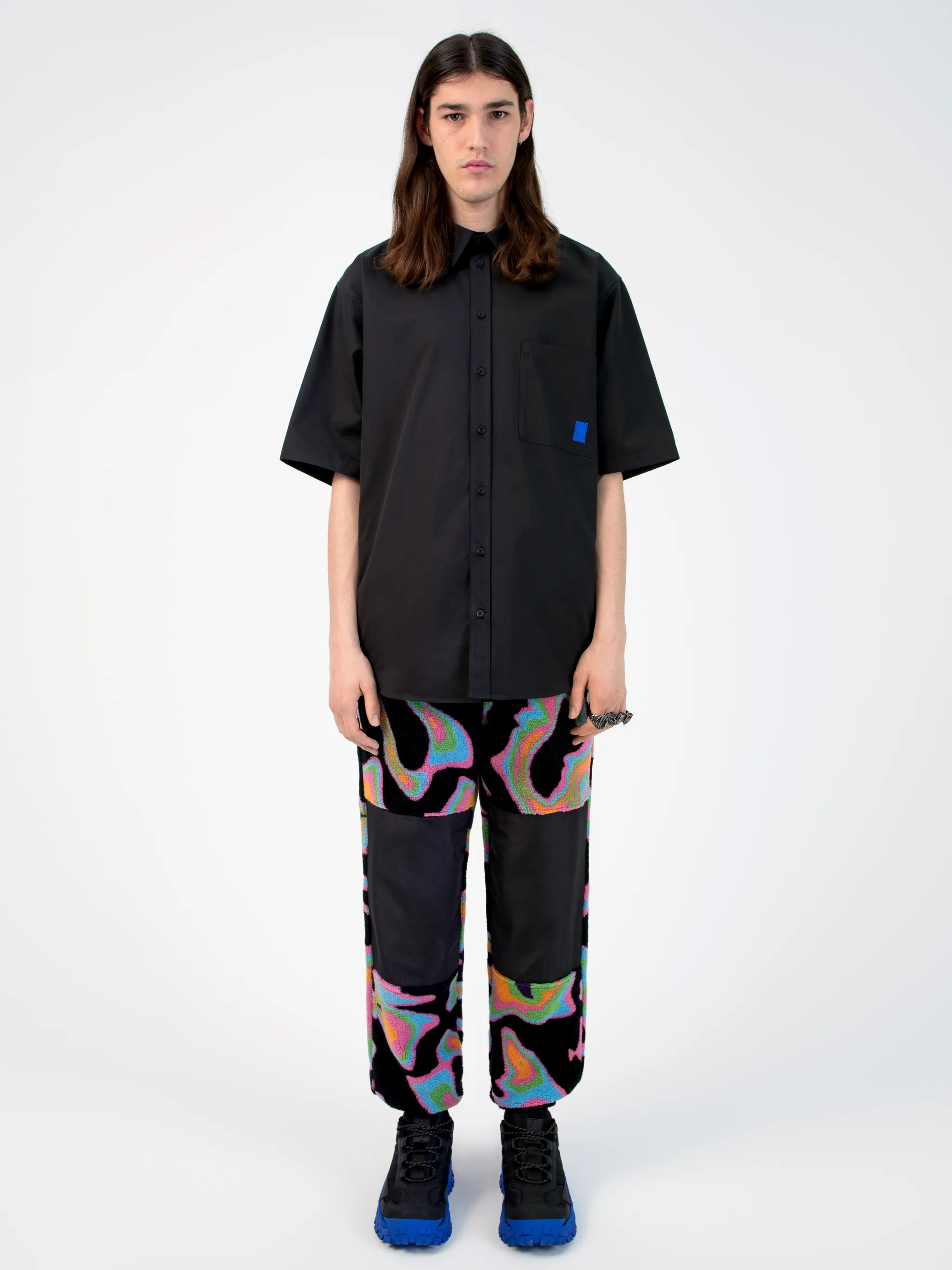 Black cotton logo-print short-sleeve shirt from Marcelo Burlon County of Milan featuring logo print to the rear, logo patches to the front, classic collar, front button fastening, short sleeves, chest patch pocket and curved hem.