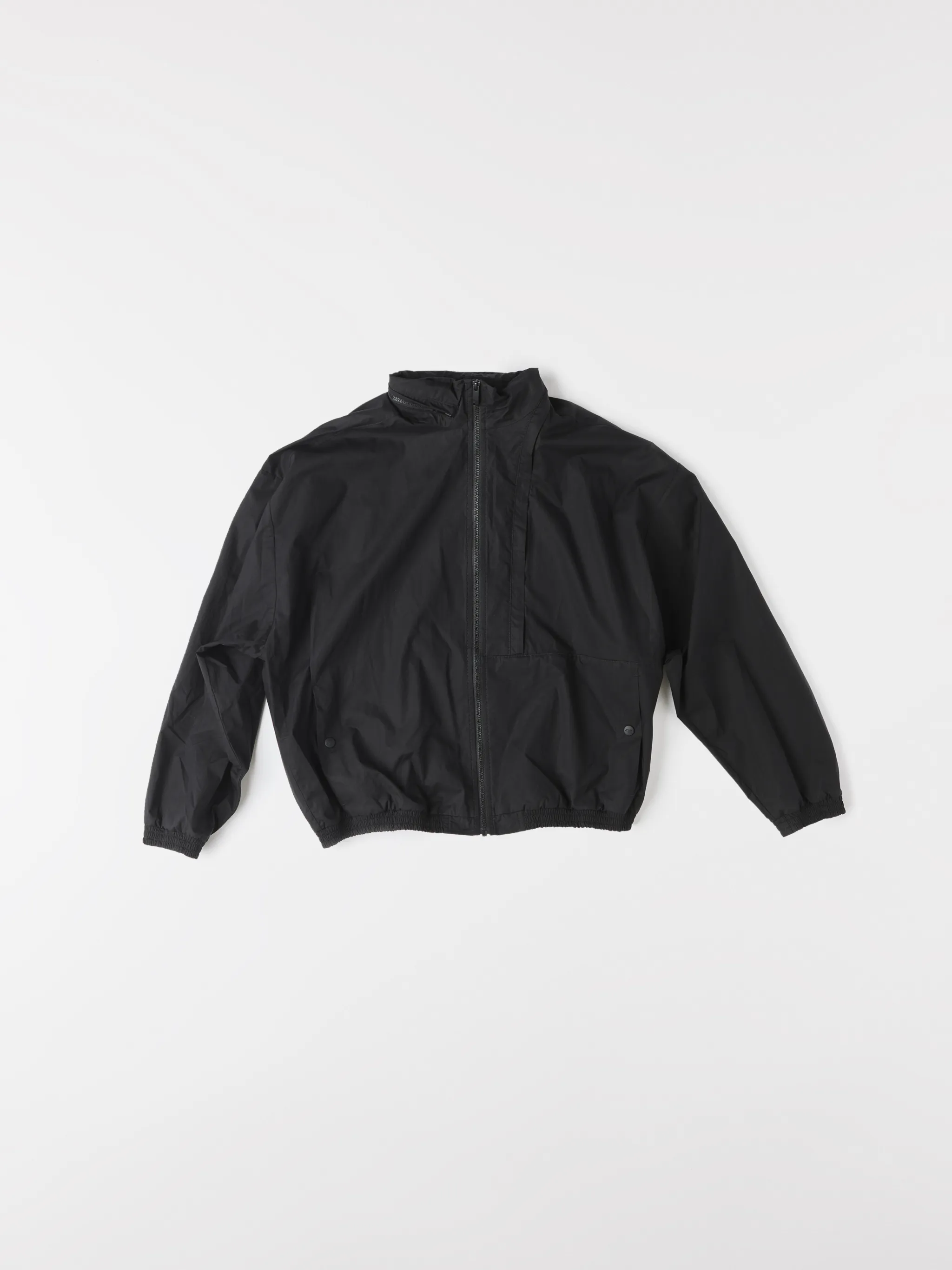 Black cotton-blend logo-print zip-up track jacket from Marcelo Burlon County of Milan featuring logo print to the rear, concealed hood, high neck, front zip fastening, long sleeves, elasticated cuffs and elasticated hem.