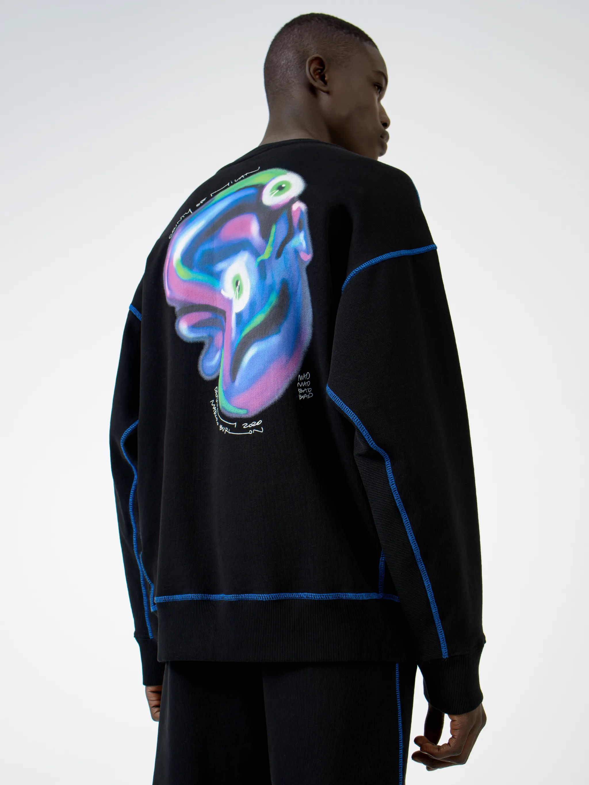 Black cotton Mad Face crew-neck sweatshirt from Marcelo Burlon County of Milan featuring logo print at the chest, graphic print to the rear, contrasting trim, crew neck, long sleeves and straight hem.