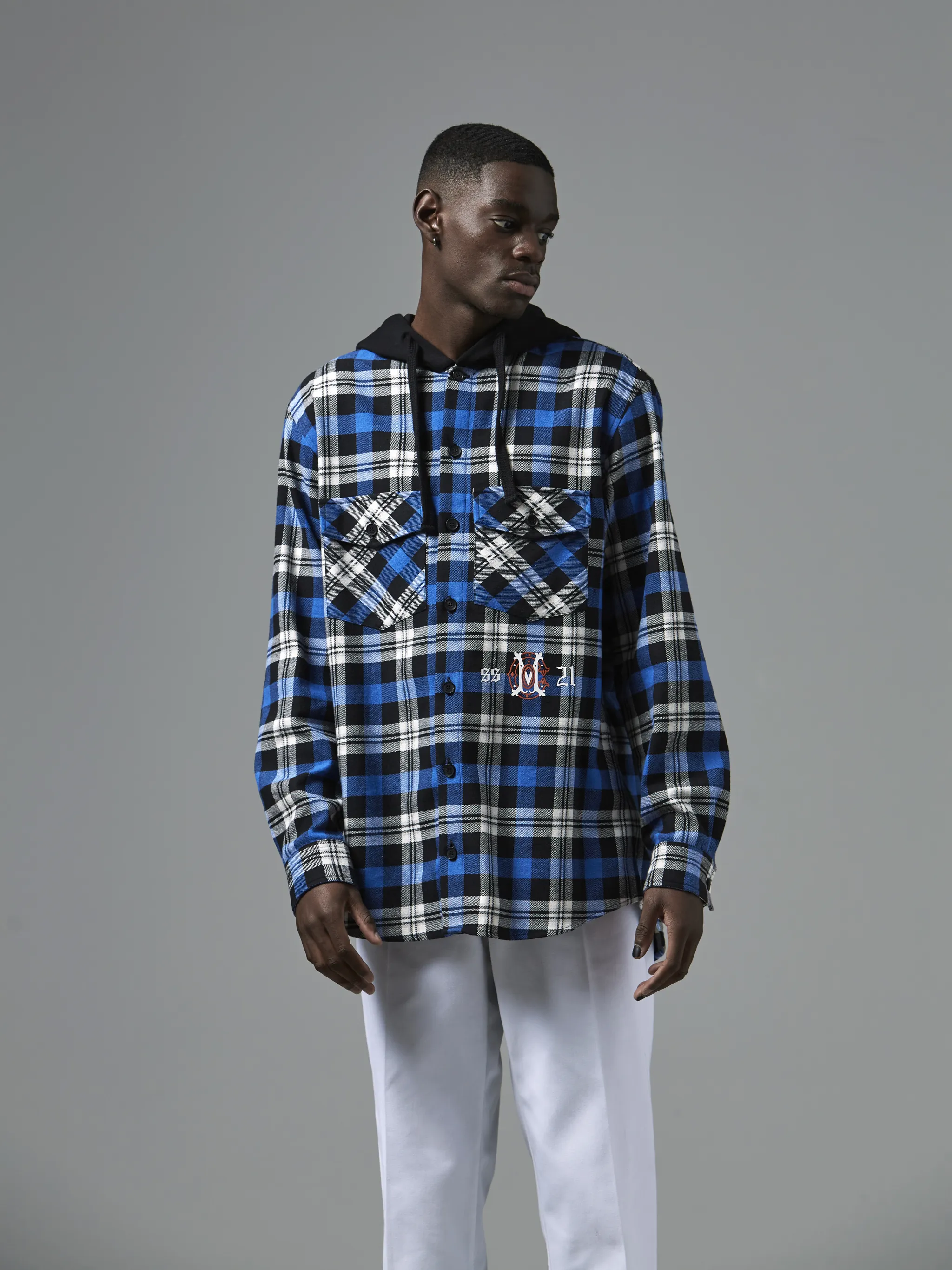 Black/blue cotton blend monogram check shirt-style hoodie from Marcelo Burlon County of Milan featuring plaid check pattern, drawstring hood, front button fastening, two chest patch pockets, embroidered logo, long sleeves, buttoned cuffs and curved hem.