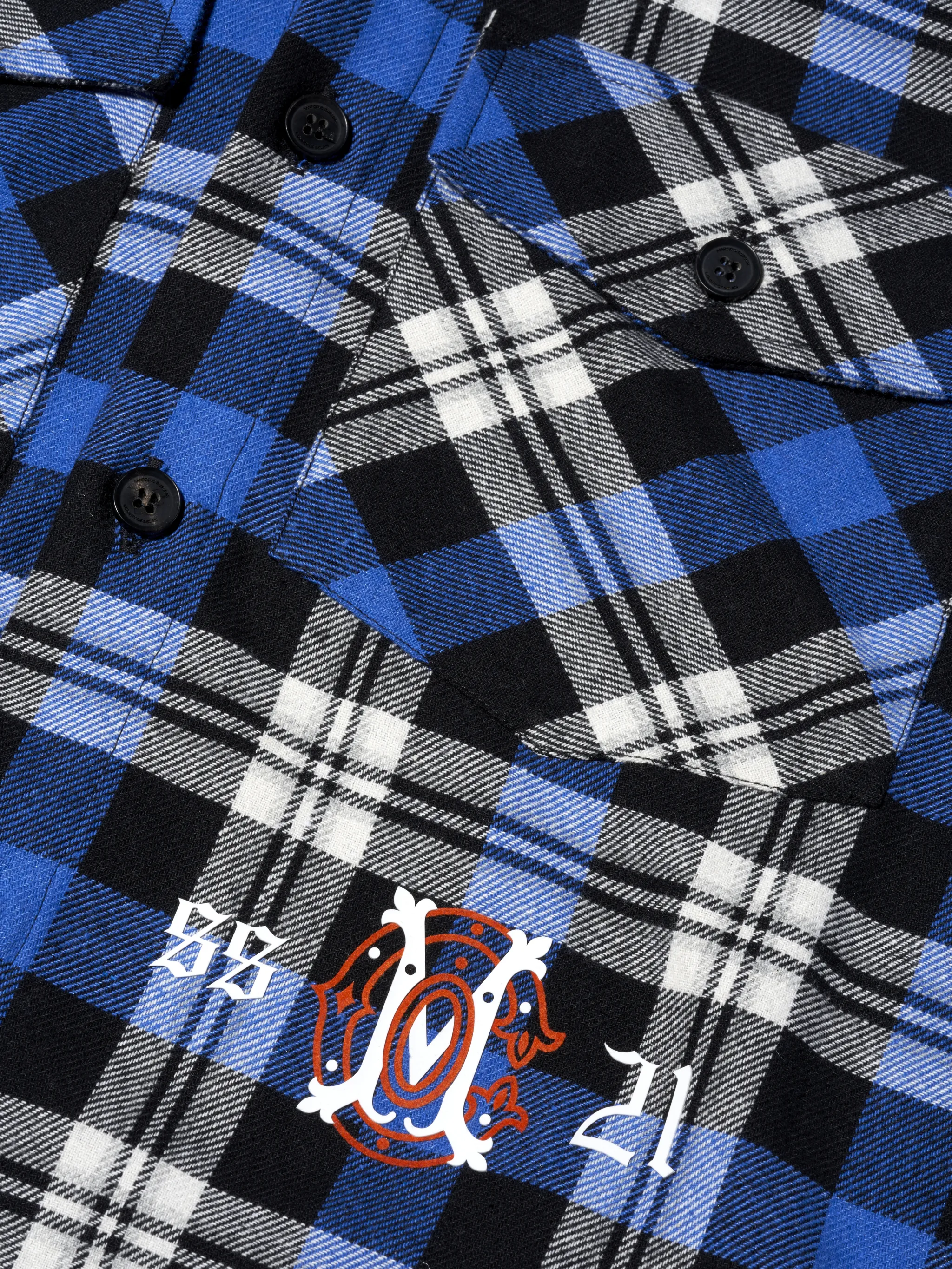 Black/blue cotton blend monogram check shirt-style hoodie from Marcelo Burlon County of Milan featuring plaid check pattern, drawstring hood, front button fastening, two chest patch pockets, embroidered logo, long sleeves, buttoned cuffs and curved hem.