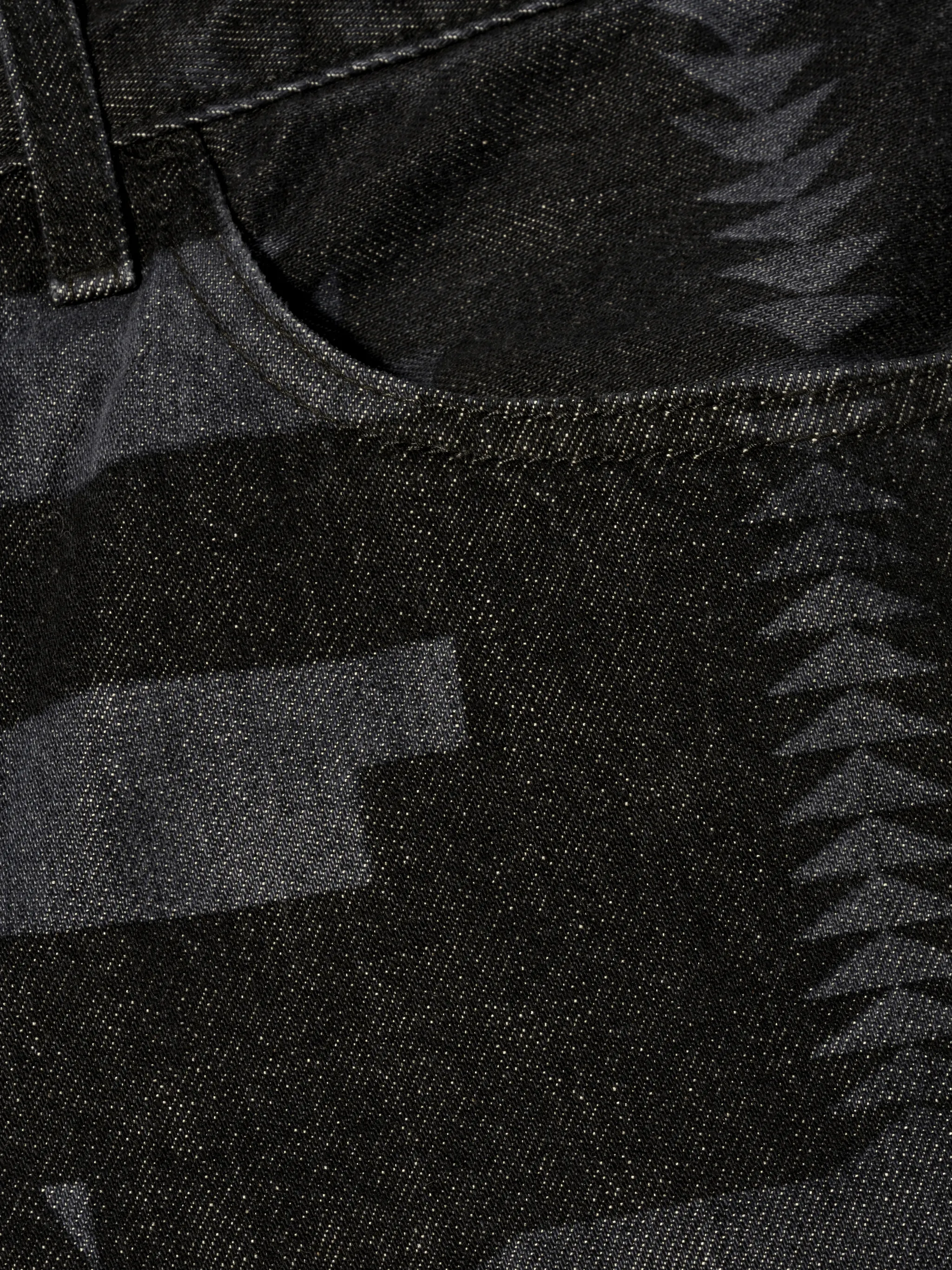 Black/grey cotton-denim geometric-print jeans from Marcelo Burlon County of Milan featuring belt loops, logo patch to the rear, front button and zip fastening, classic five pockets and geometric print.