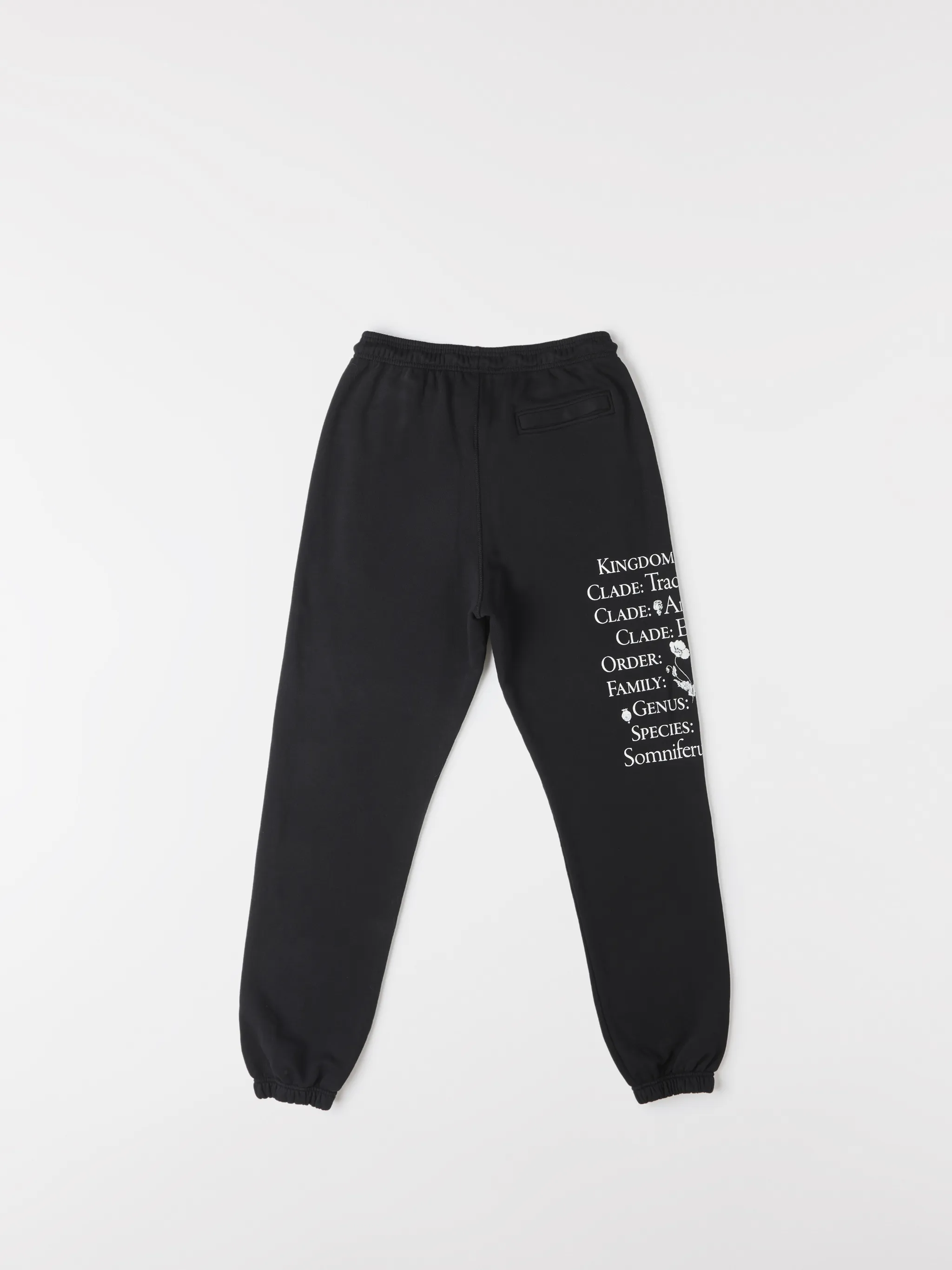 Black cotton Papaver tapered track pants from Marcelo Burlon County of Milan featuring embroidered logo to the front, slogan print, elasticated ankles, elasticated waistband, drawstring fastening, tapered design, two side slit pockets and rear welt pocket.