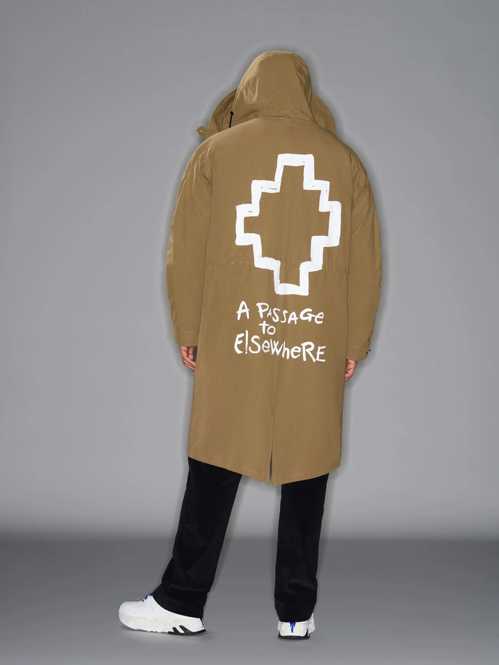 Green cotton Cross logo hooded parka from Marcelo Burlon County of Milan featuring signature Cross motif, slogan print, logo print at the chest, drawstring hood, concealed front fastening, drawstring fastening waist, two side flap pockets, long sleeves and central rear vent.