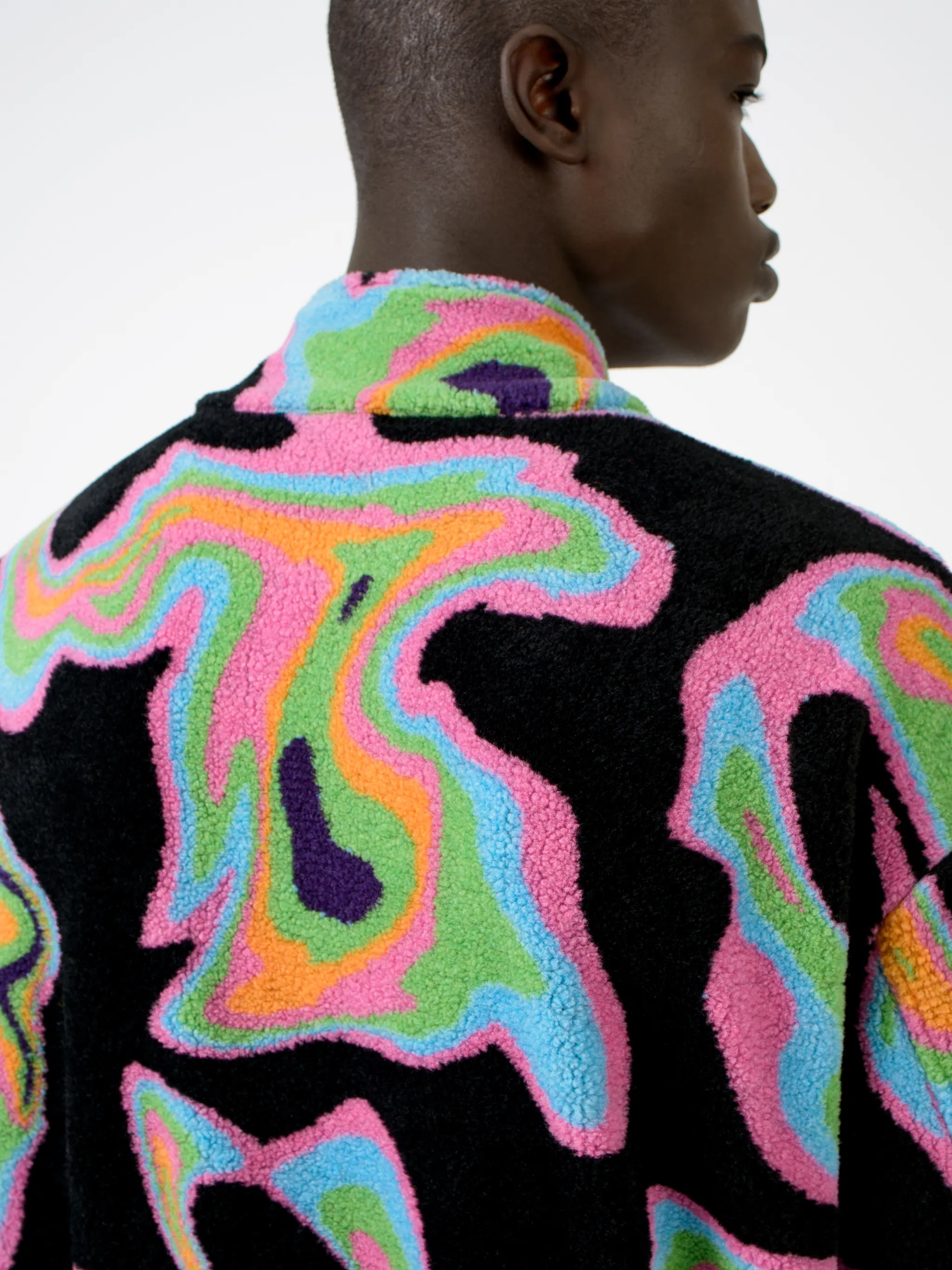 Black/multicolour intarsia Psych pattern track jacket from Marcelo Burlon County of Milan featuring patterned intarsia knit, stand-up collar, front zip fastening, long sleeves, elasticated cuffs and elasticated hem.