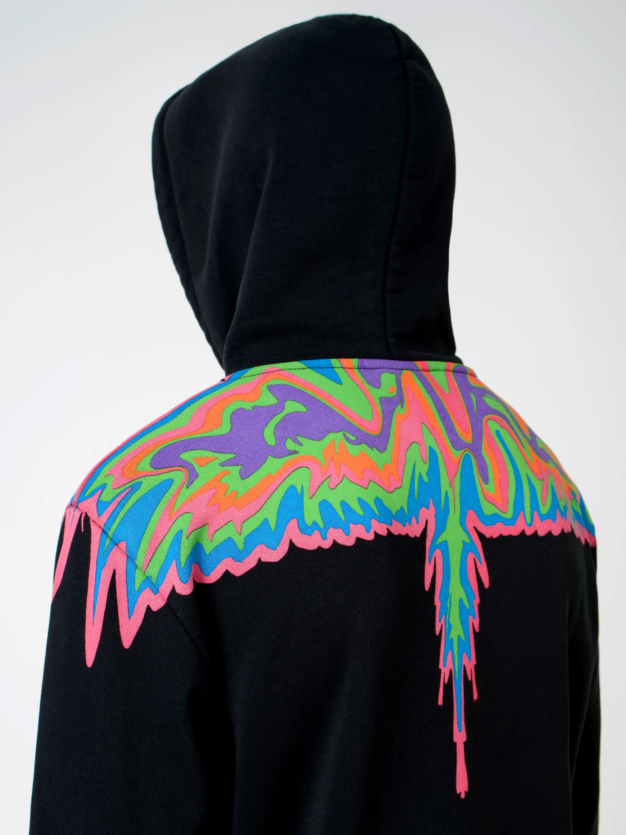 Black multicolour cotton psychedelic drip cotton hoodie from Marcelo Burlon County of Milan featuring drawstring hood.