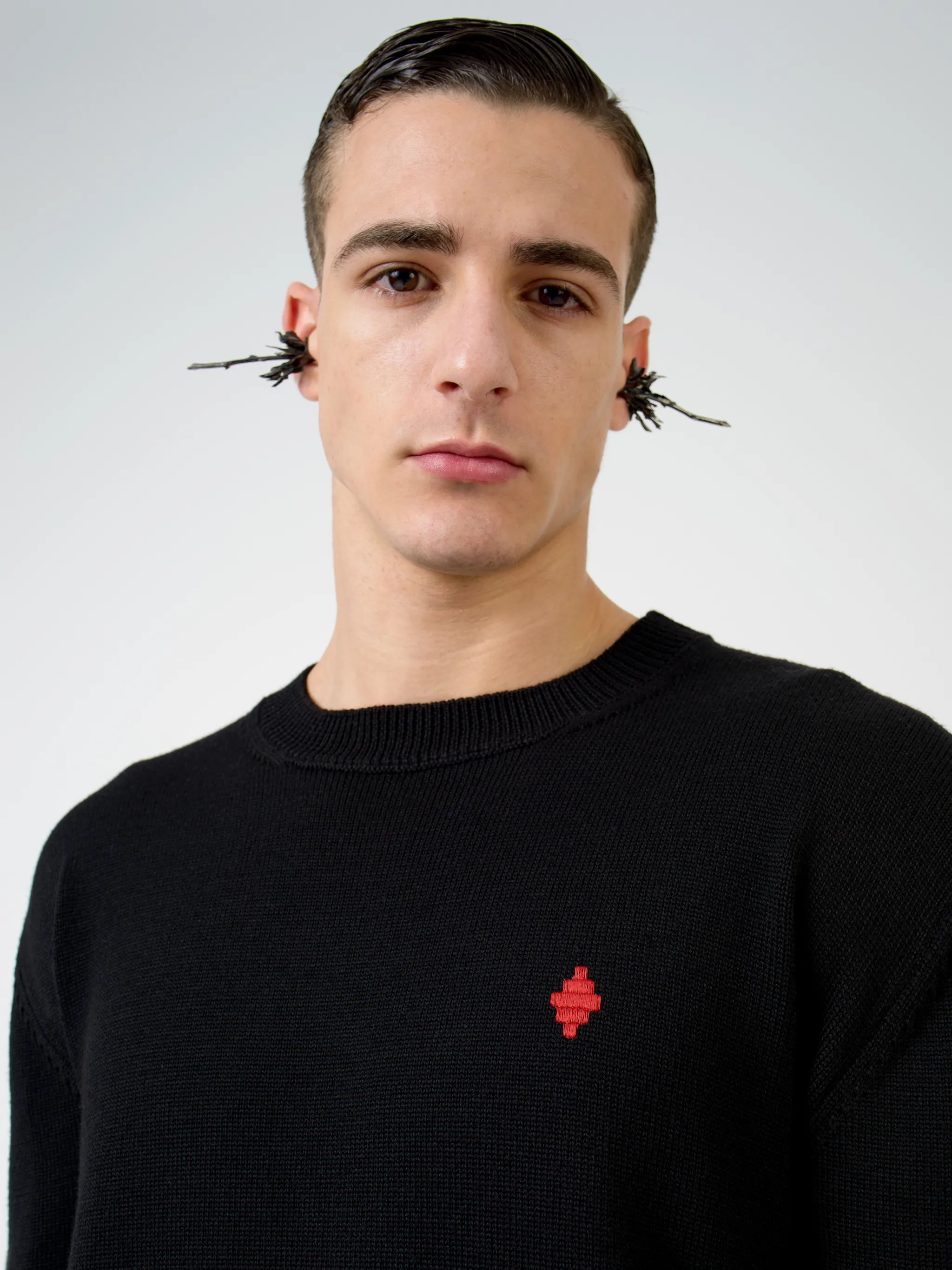 Black cotton Rural Cross crew-neck sweatshirt from Marcelo Burlon County of Milan featuring embroidered logo at the chest, appliqué detail, ribbed edge, crew neck, long sleeves and straight hem.
