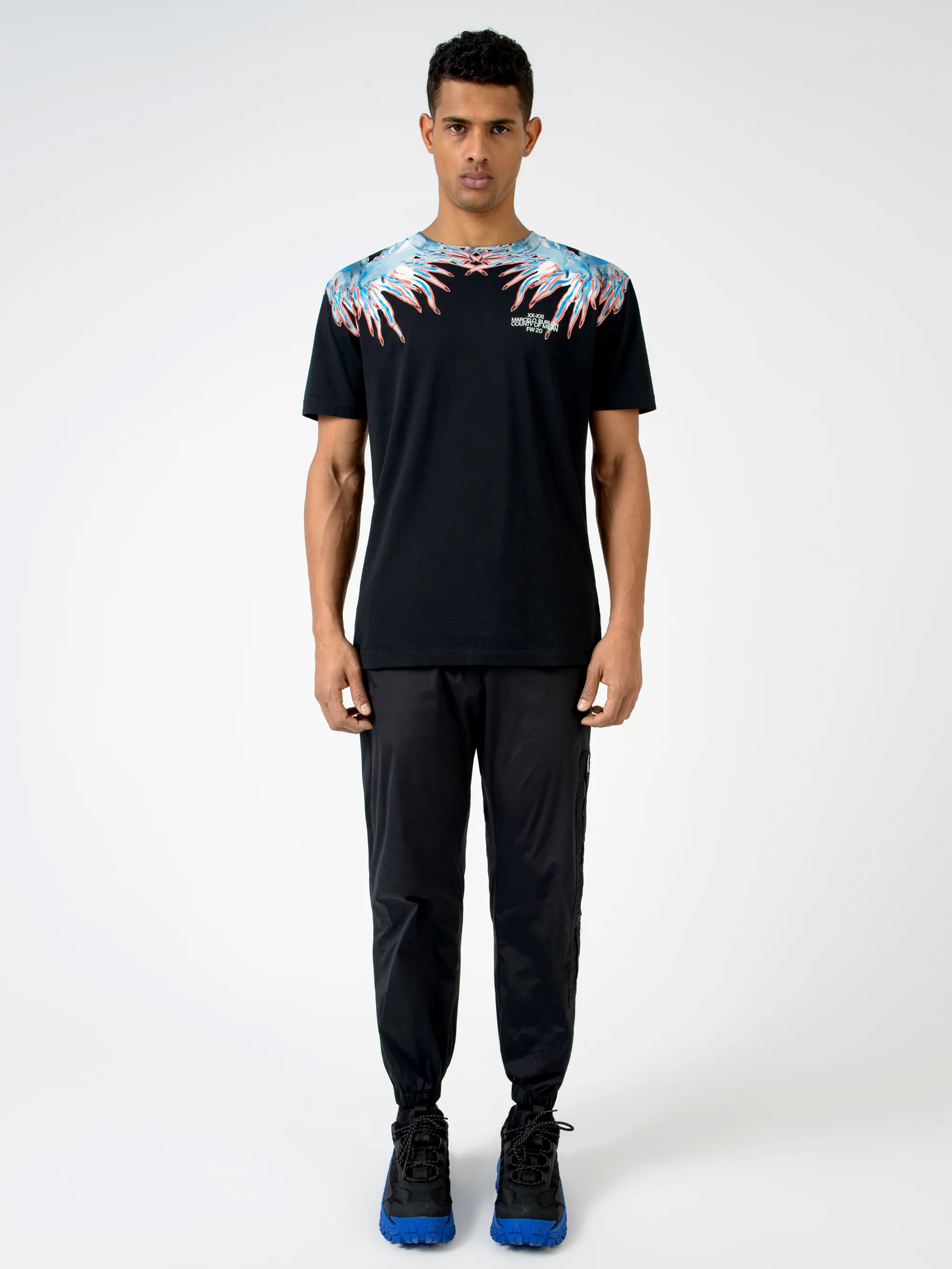 Black cotton Sea Snail-print T-shirt from Marcelo Burlon County of Milan featuring graphic print, round neck, short sleeves and straight hem.