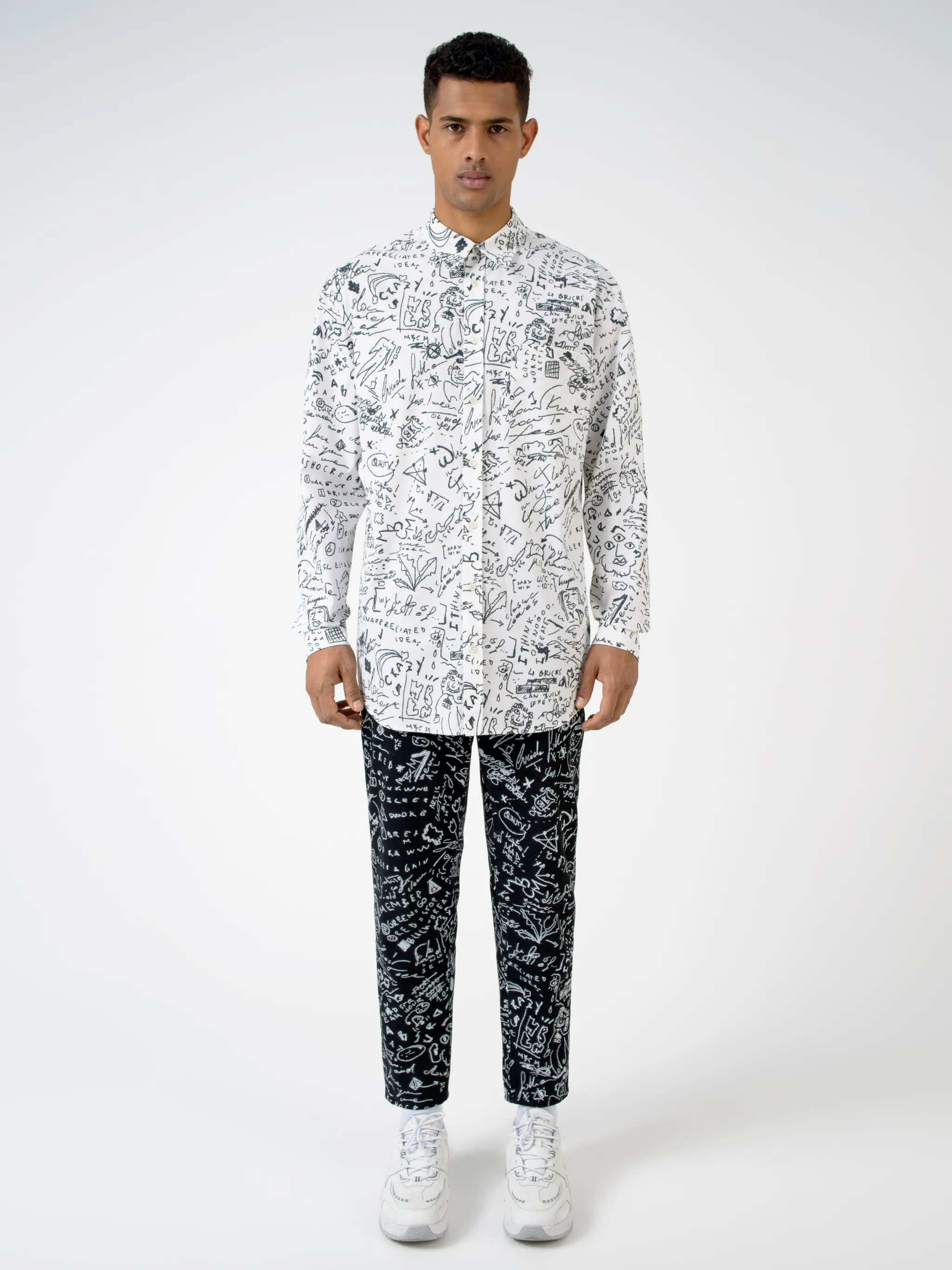 White cotton Sketches long-sleeve shirt from Marcelo Burlon County of Milan featuring classic collar, front button fastening, long sleeves, chest patch pocket, buttoned cuffs, curved hem and all-over sketches pattern.