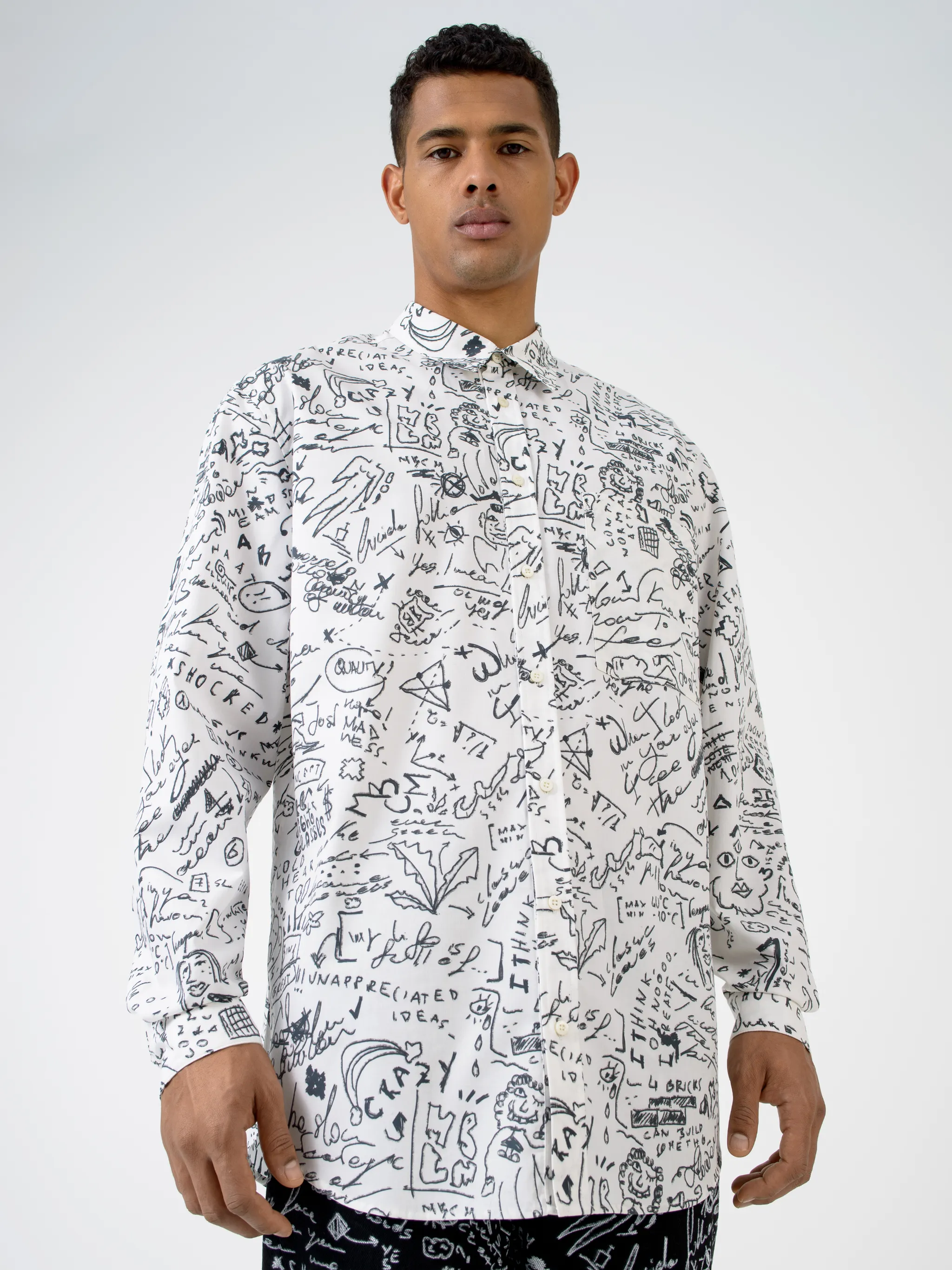 White cotton Sketches long-sleeve shirt from Marcelo Burlon County of Milan featuring classic collar, front button fastening, long sleeves, chest patch pocket, buttoned cuffs, curved hem and all-over sketches pattern.