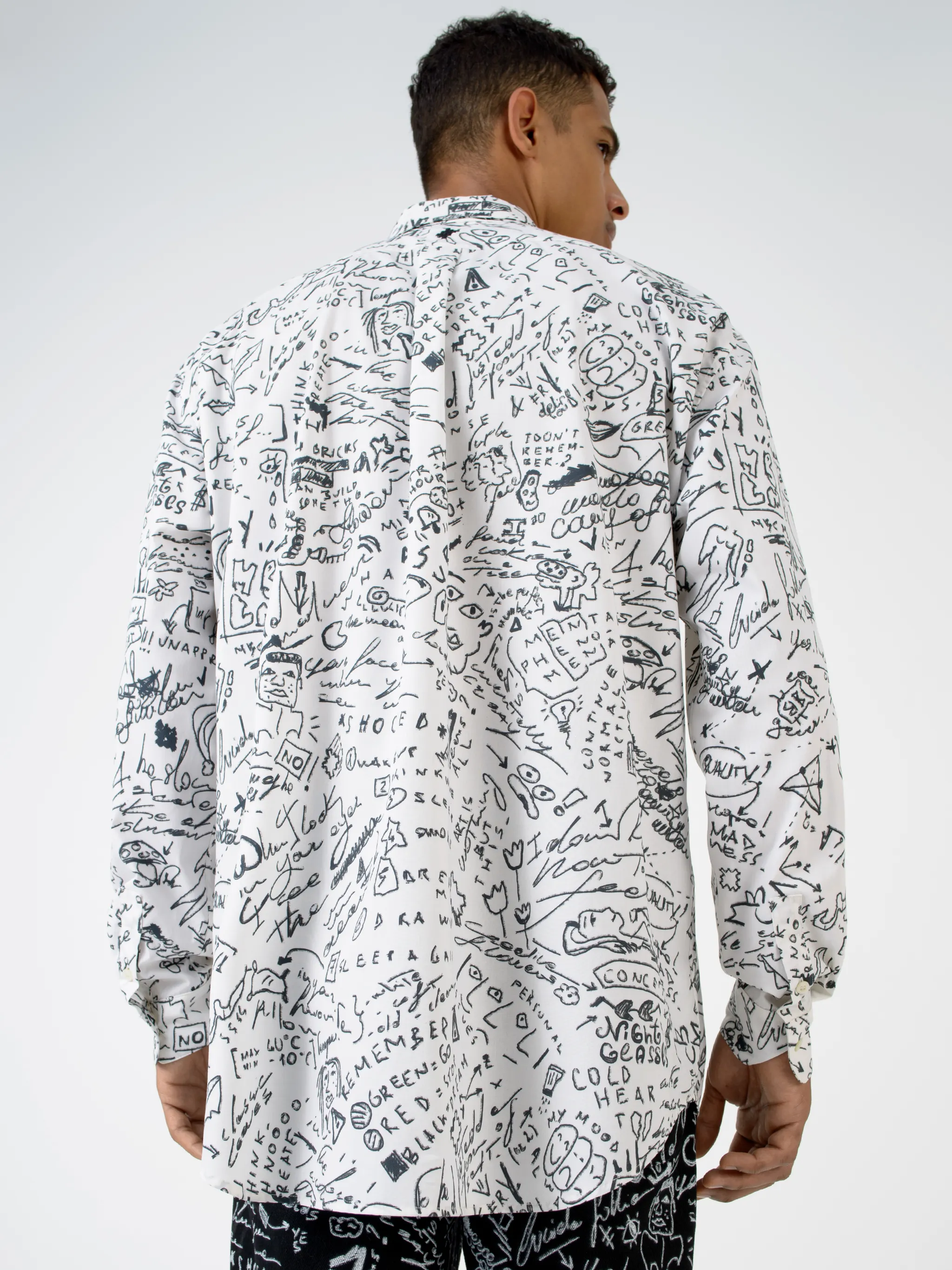 White cotton Sketches long-sleeve shirt from Marcelo Burlon County of Milan featuring classic collar, front button fastening, long sleeves, chest patch pocket, buttoned cuffs, curved hem and all-over sketches pattern.