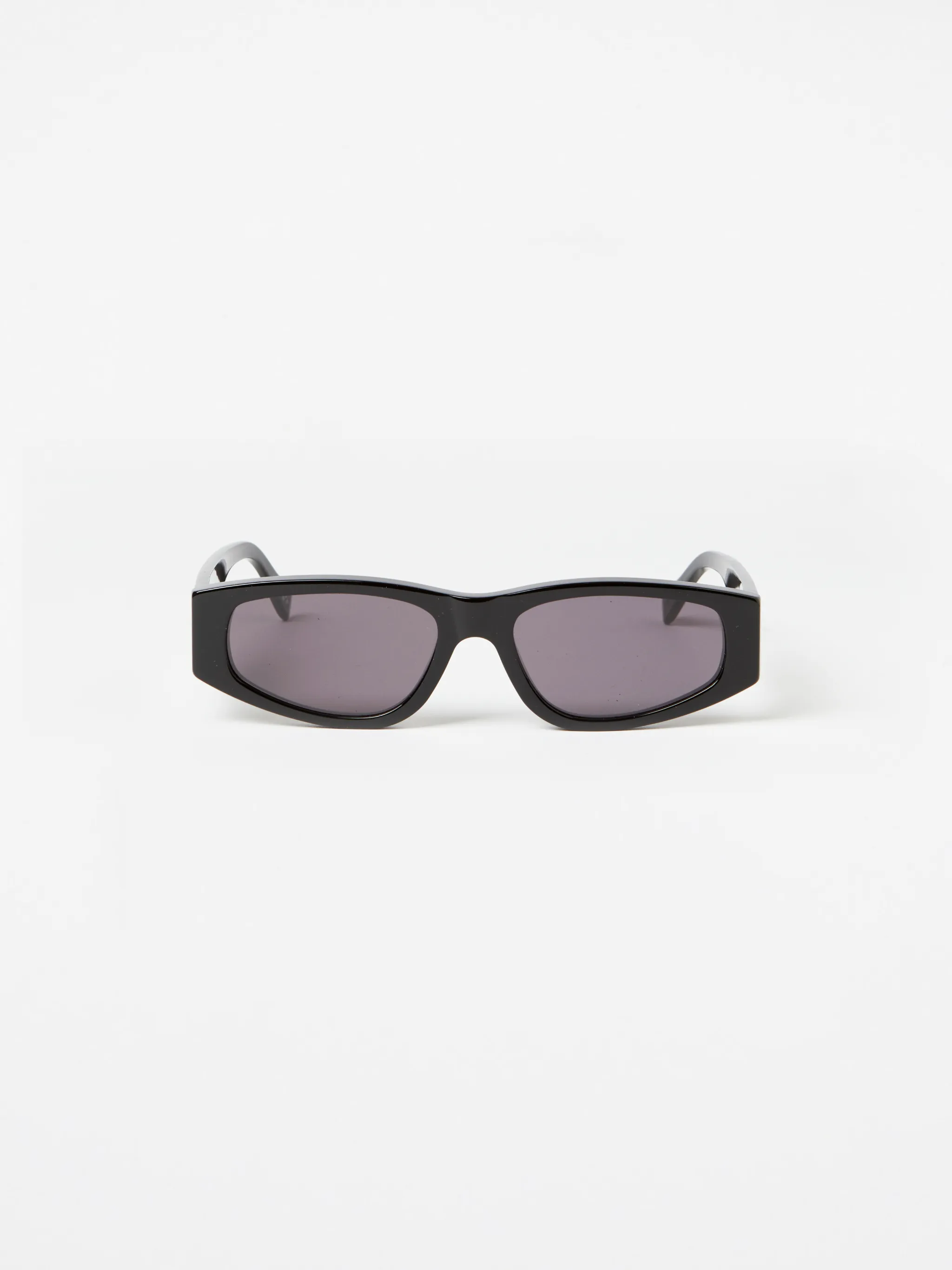 Black acetate futuristic rectangular-frame sunglasses from Marcelo Burlon County of Milan featuring rectangle frame, tinted lenses and curved tips. We know you'll look after them, but these glasses come with protection, just in case.