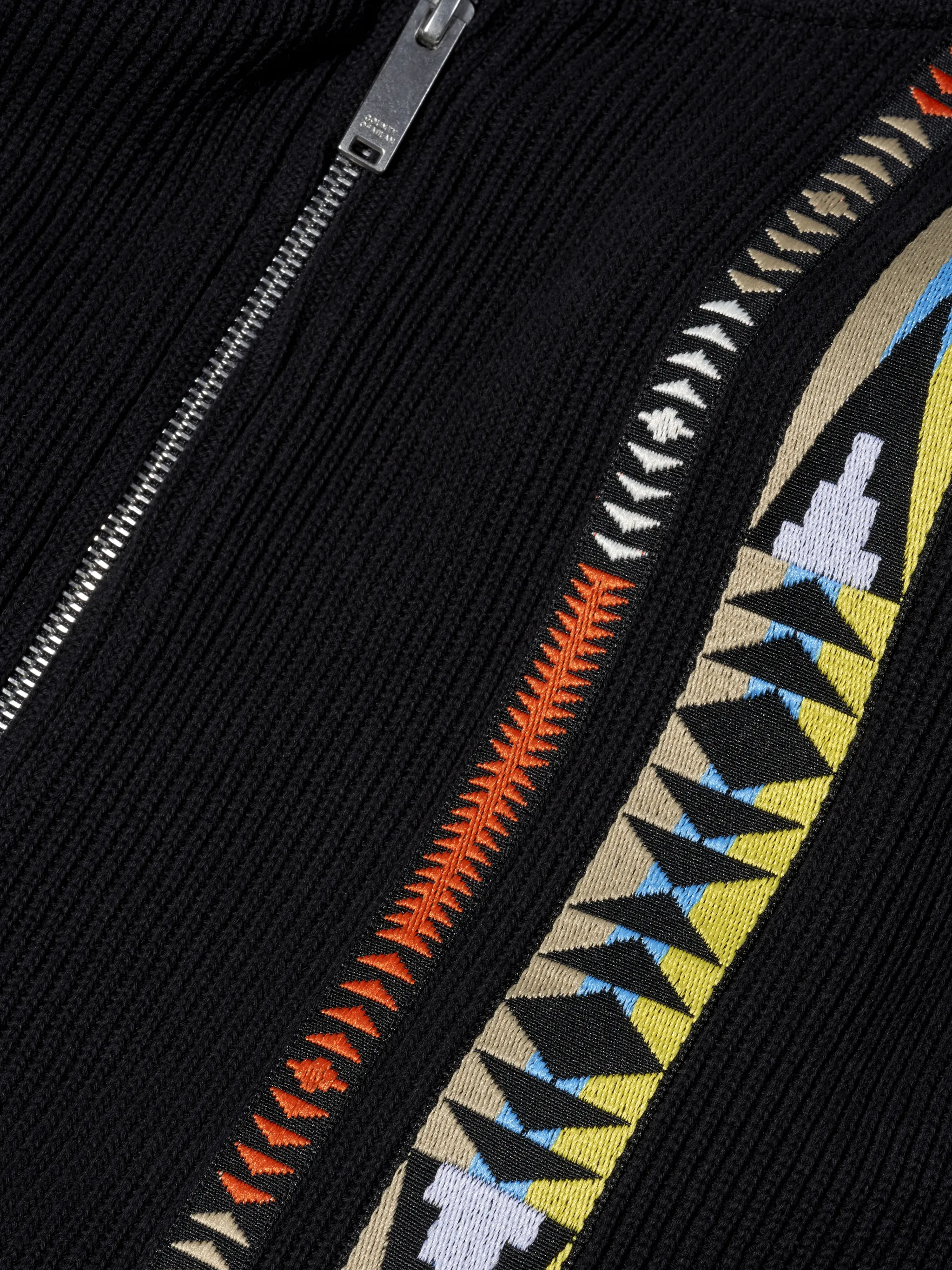 Black cotton tape knit hoodie from Marcelo Burlon County of Milan featuring drawstring hood, front zip fastening, long sleeves and kangaroo pockets.