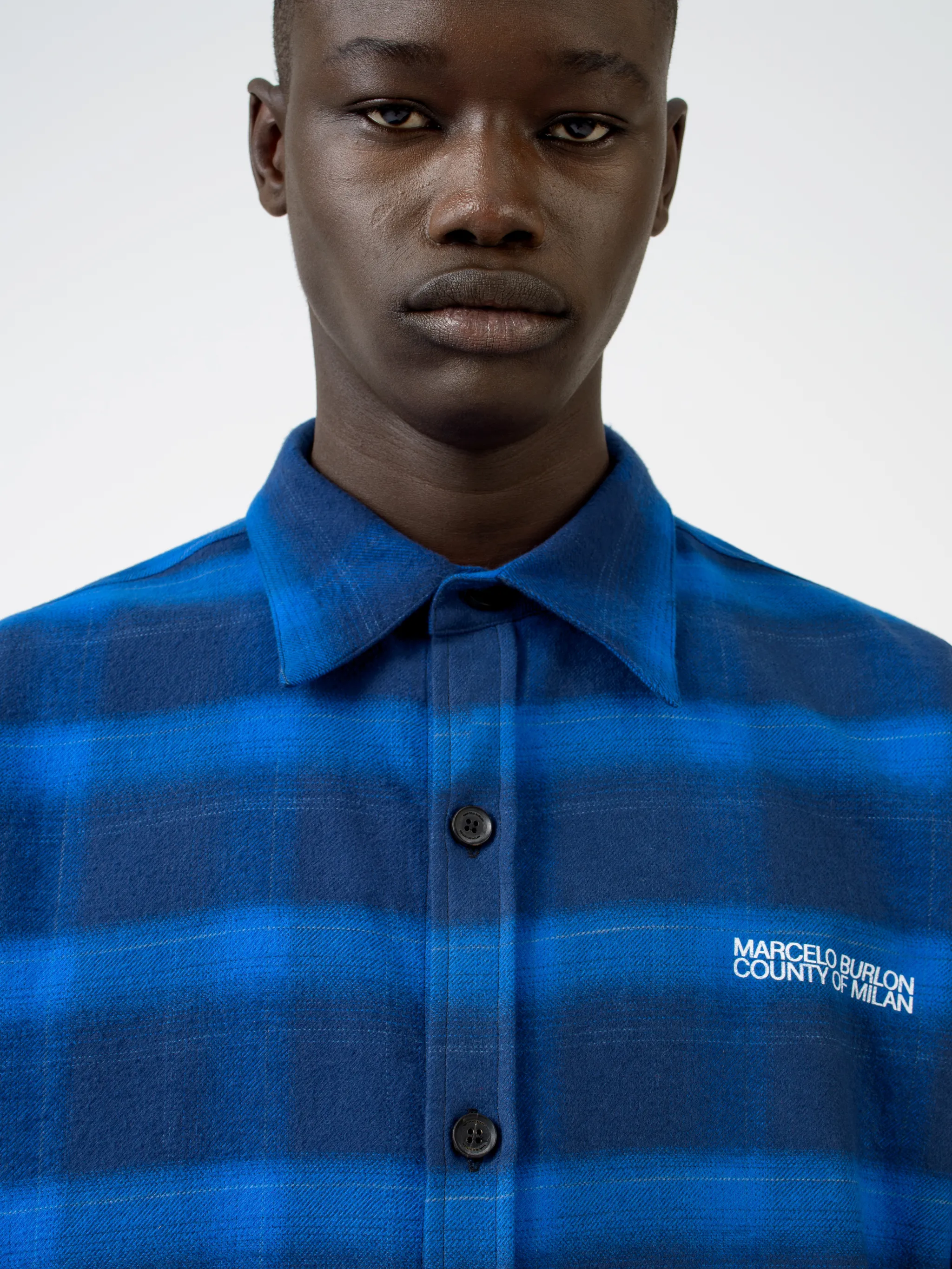 Blue/black cotton Tiger check-pattern shirt from Marcelo Burlon County of Milan featuring check pattern, tiger print, logo print at the chest, classic collar, front button fastening, long sleeves, buttoned cuffs and straight hem.