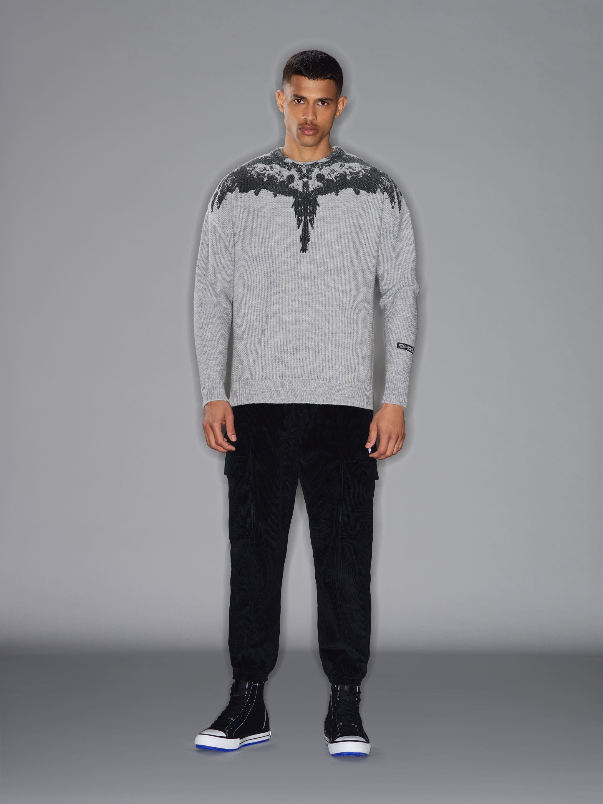 Grey wool Tempera Wings print jumper from Marcelo Burlon County of Milan featuring crew neck, drop shoulder, long sleeves, ribbed cuffs, ribbed hem and wings print.
