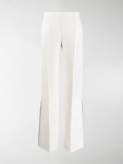 flared pants with side slits