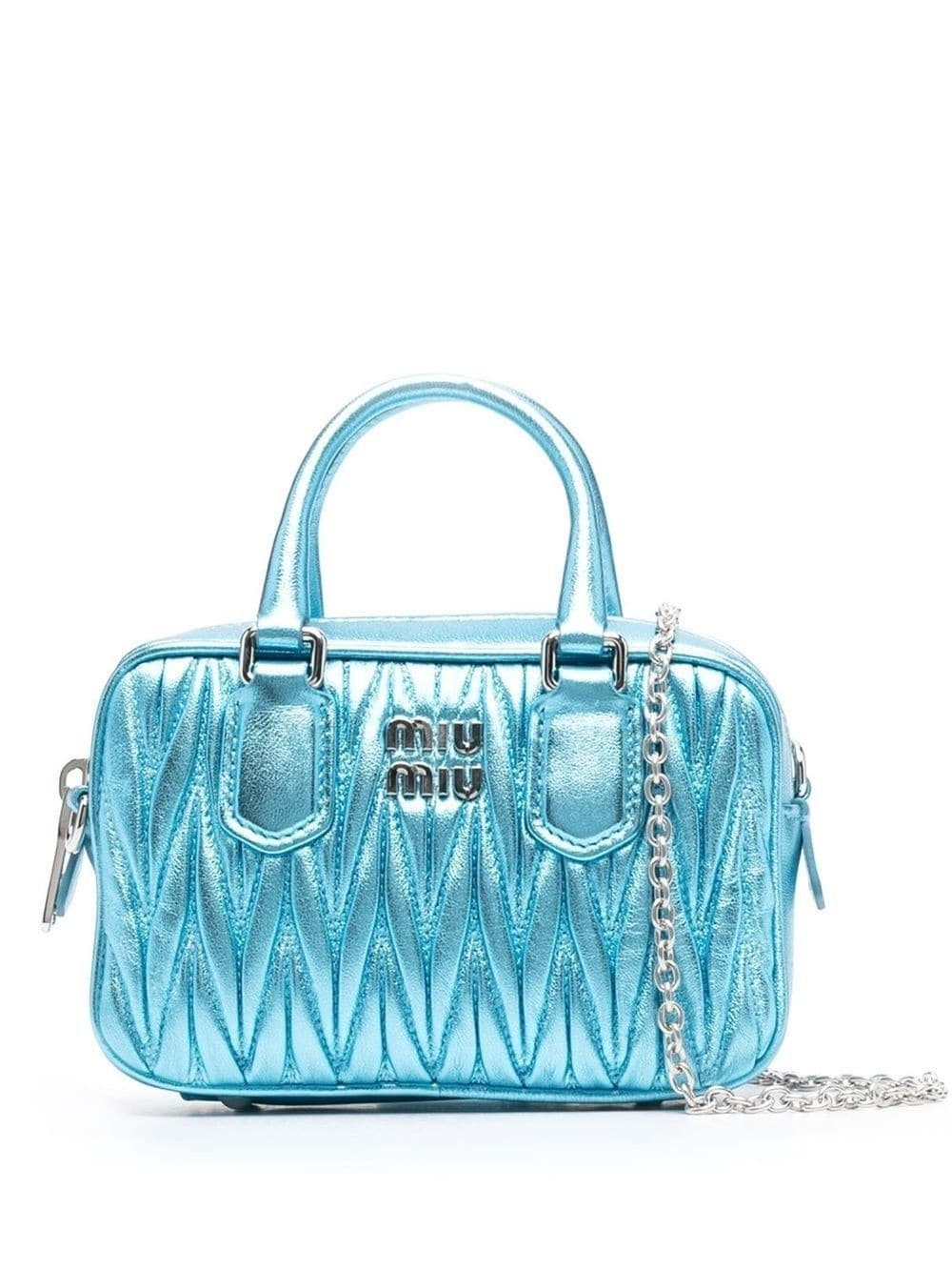 logo-plaque quilted tote bag | Miu Miu | Eraldo.com