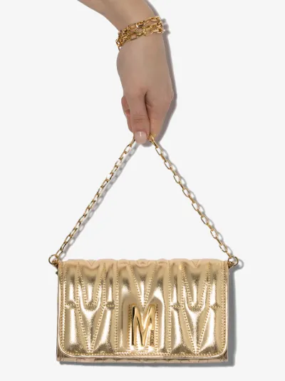 gold moschino bag