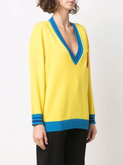 yellow moschino jumper