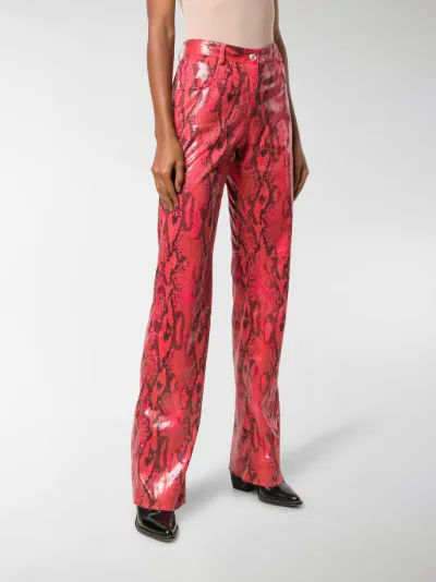 MSGM Pantaloni con effetto pelle di serpente rosso | MODES