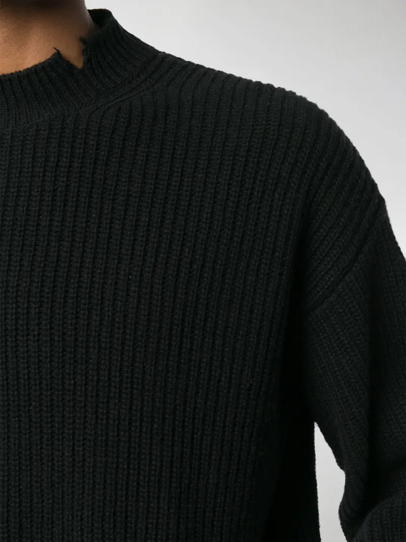 sweater with ripped edges