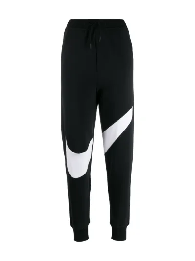 nike sportswear all over print track pants