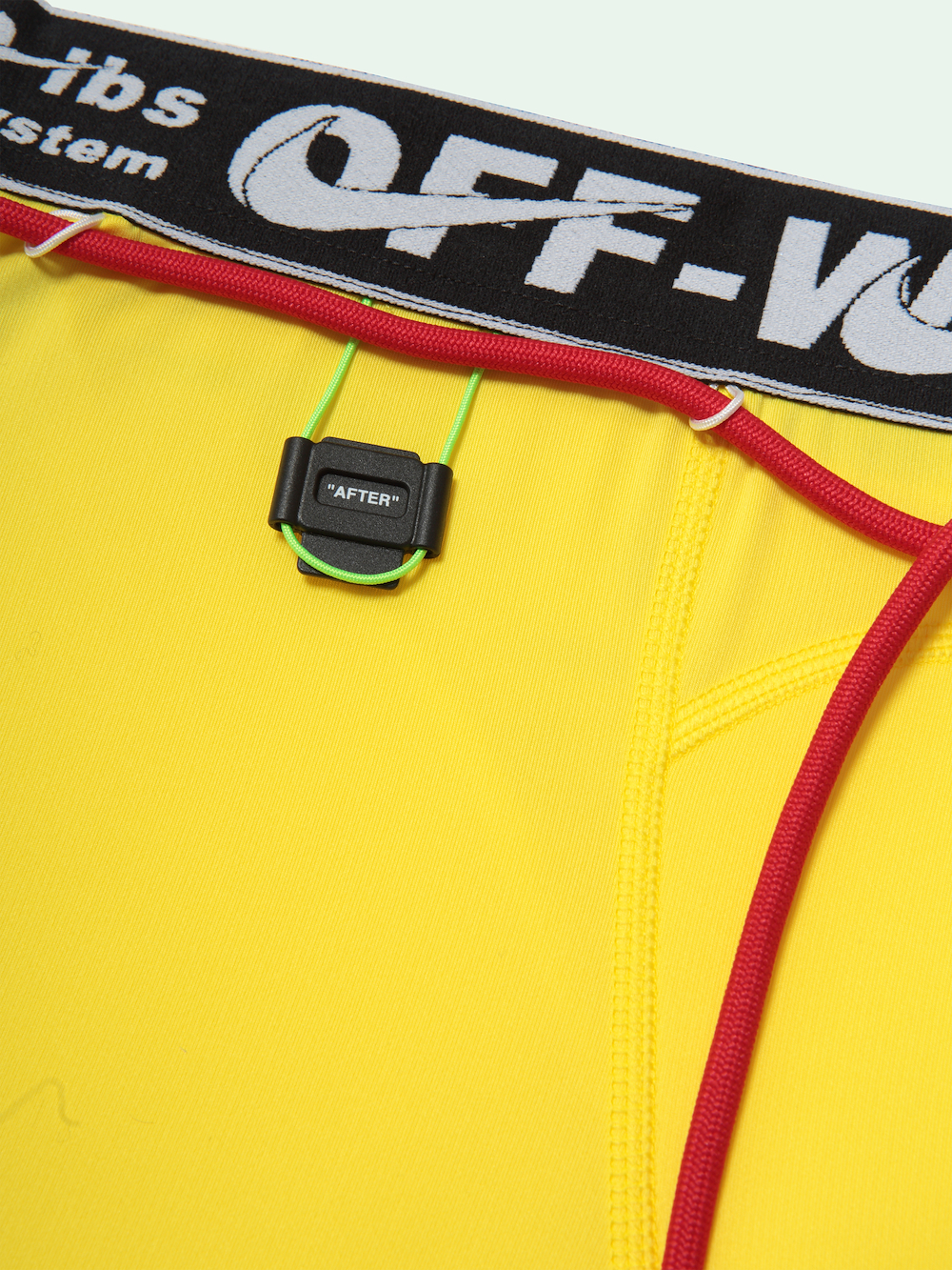 nike tech yellow pants