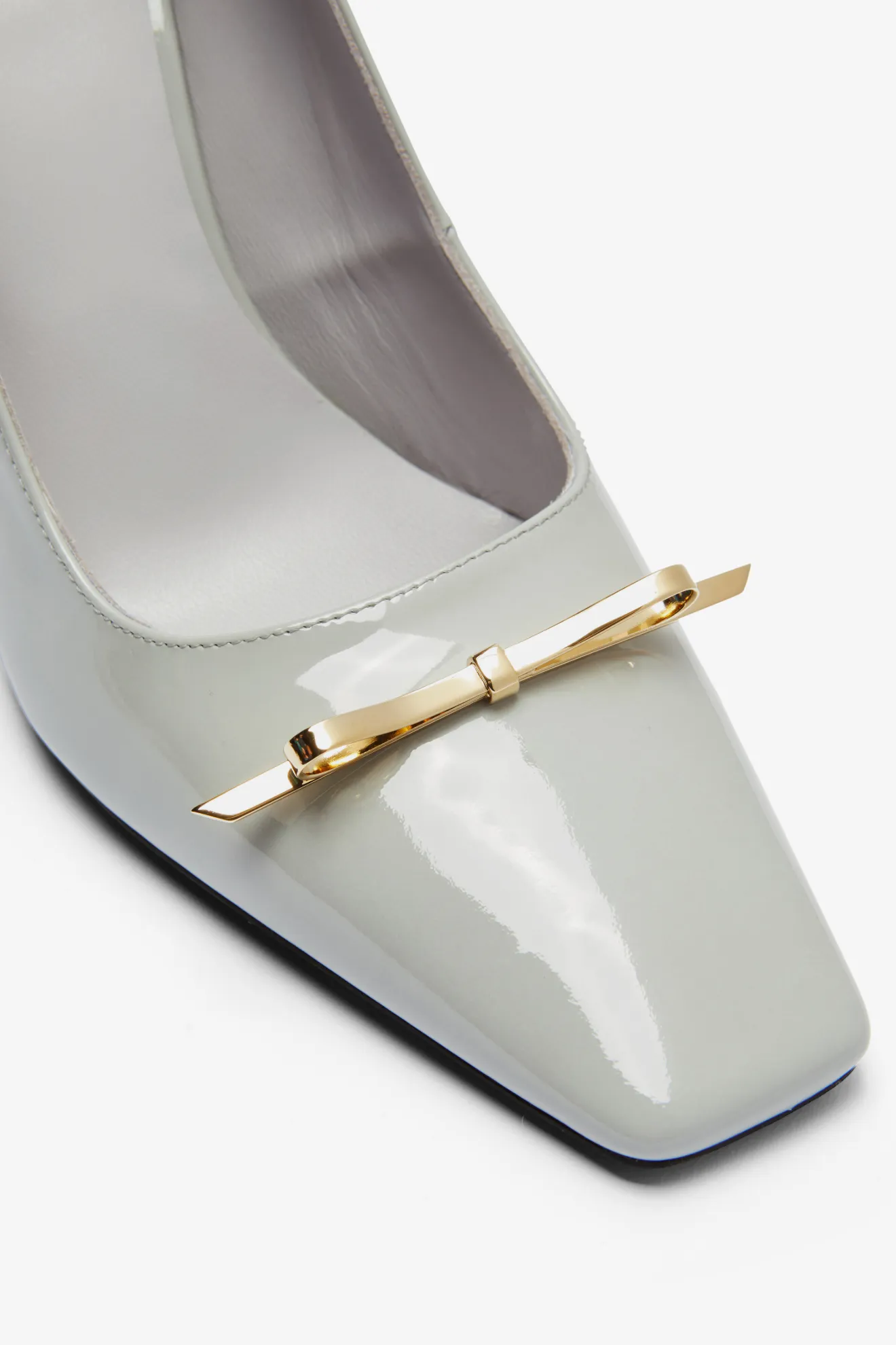 carmela patent leather bow & tassel red sole pumps