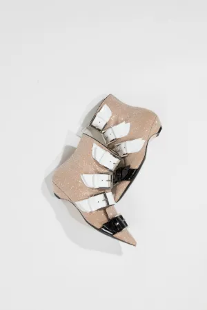 buckled glitter and patent-leather boots