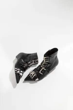 buckled leather and calf hair boots