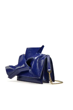 cracked-leather bow bag