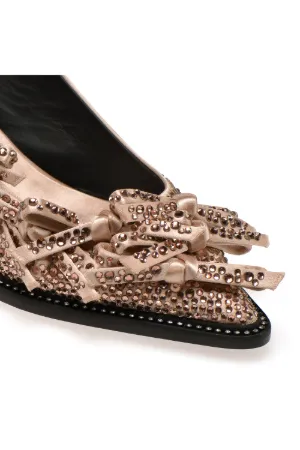 crystal and bow-embellished pumps