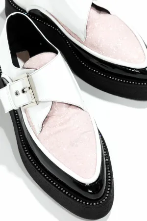 glitter and patent-leather creepers