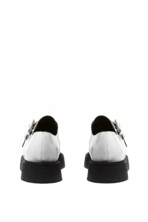 glitter and patent-leather creepers
