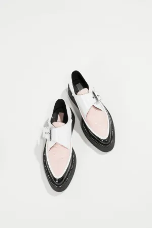 glitter and patent-leather creepers