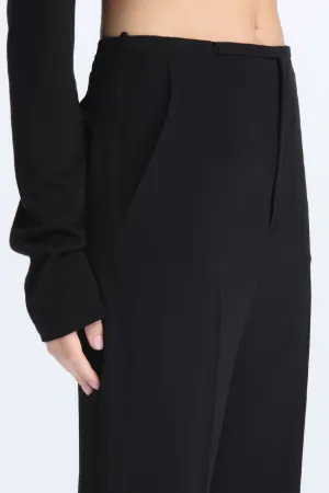 high-waisted flared trousers