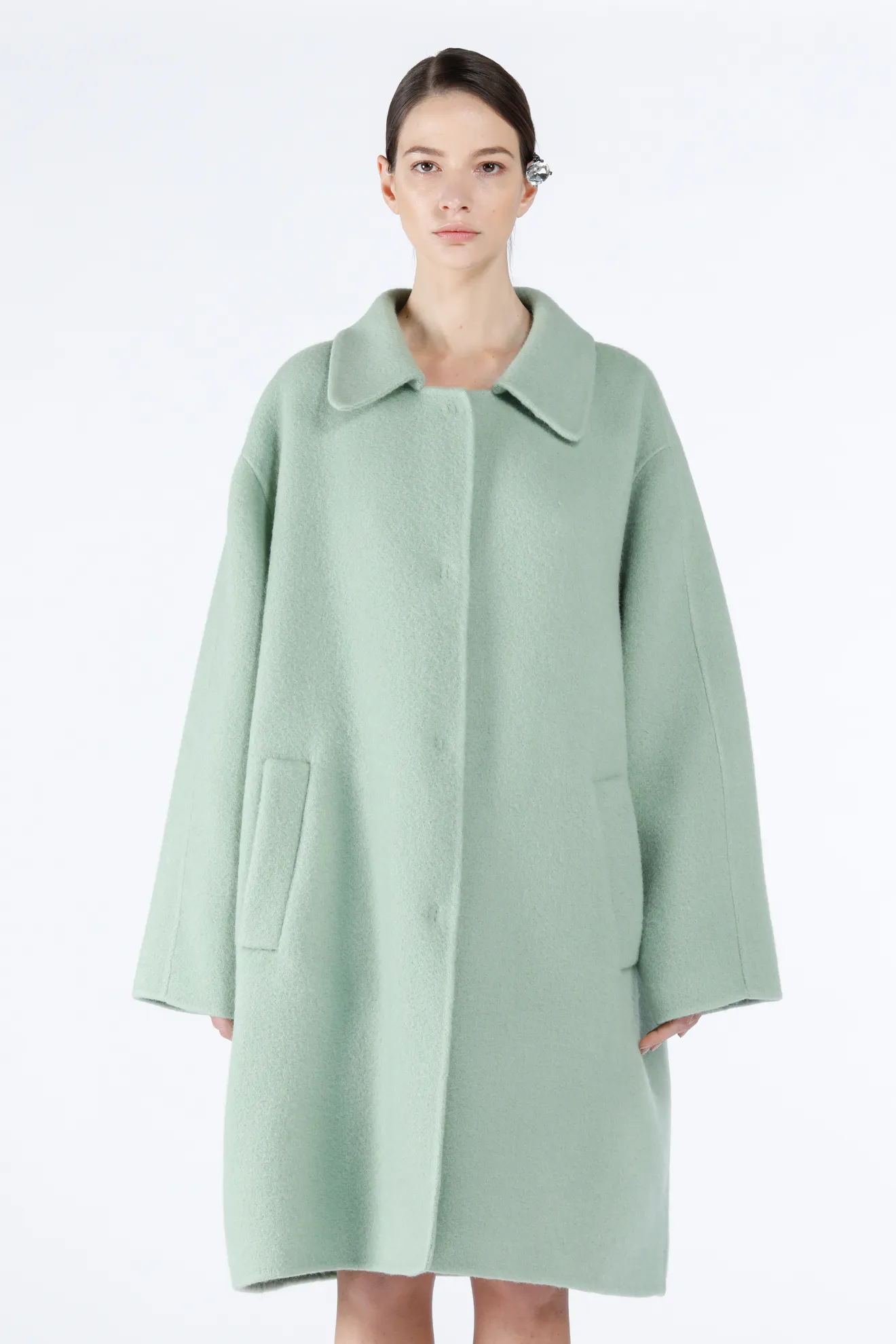 green oversized coat