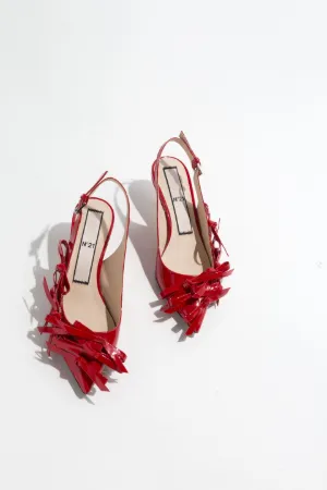 pointed bow-embellished slingback pumps