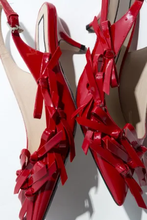 pointed bow-embellished slingback pumps