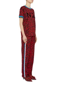leopard print trousers with red stripe