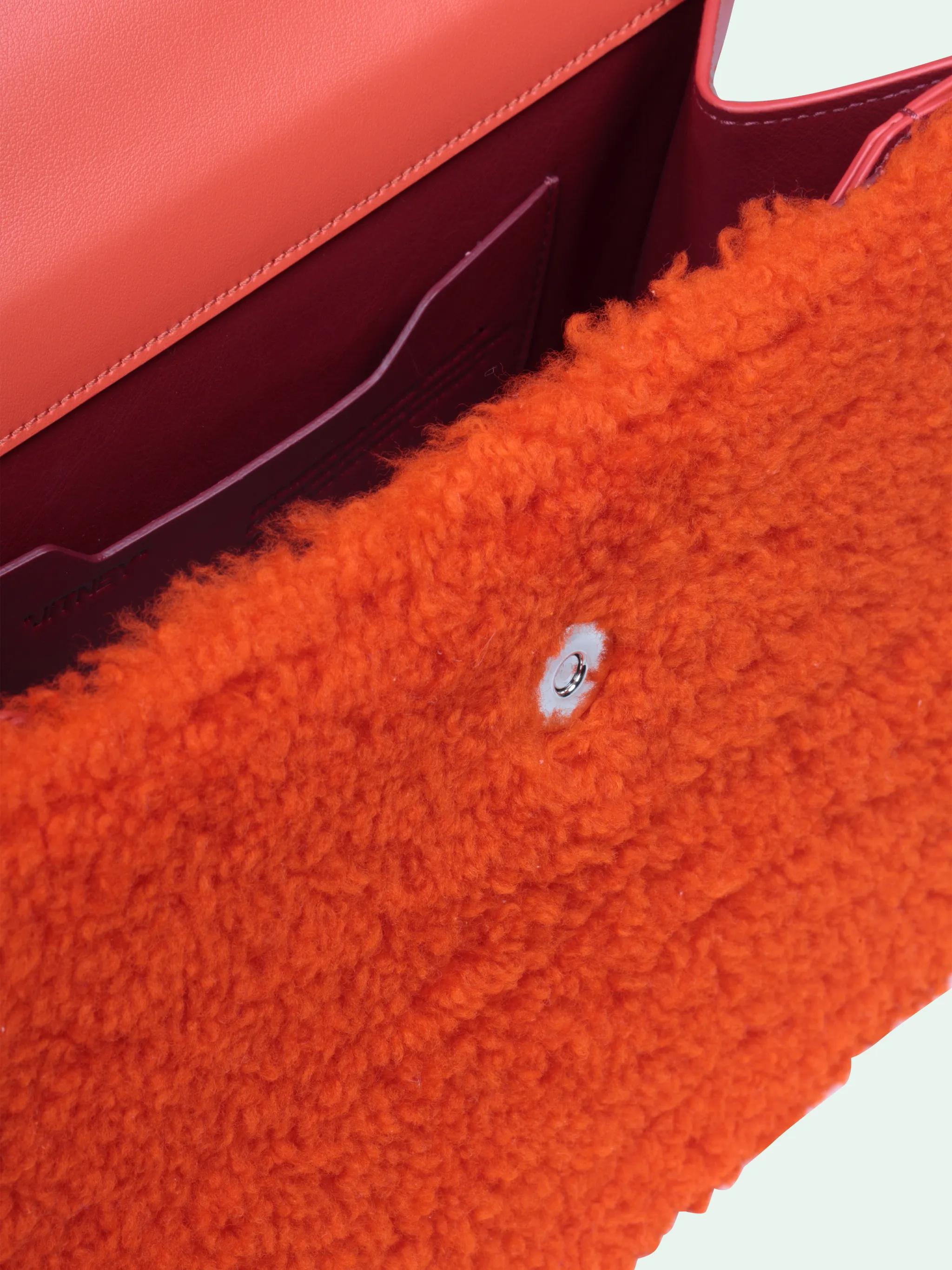 off white furry bolsa