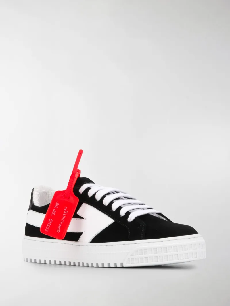 shoes with arrow logo