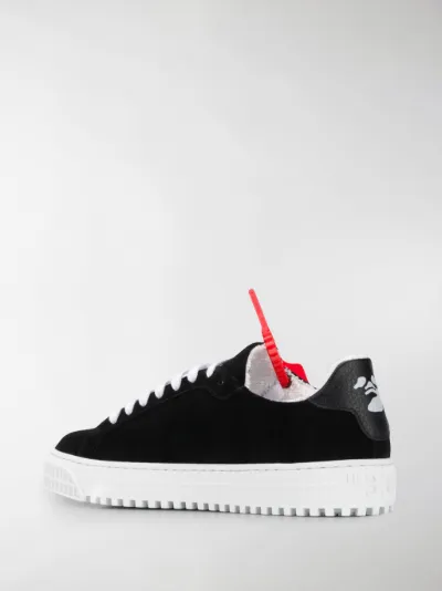 sneakers with arrow logo