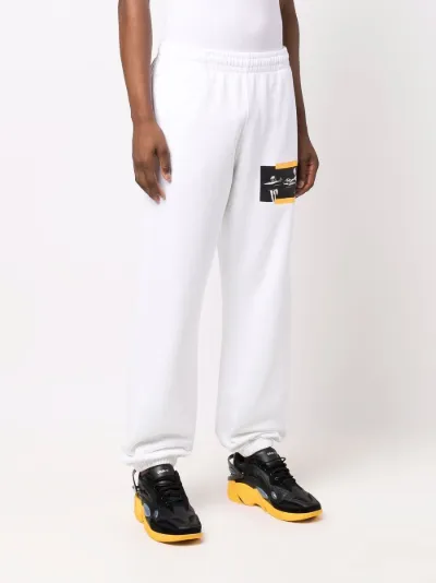 Caravaggio painting slim track pants 